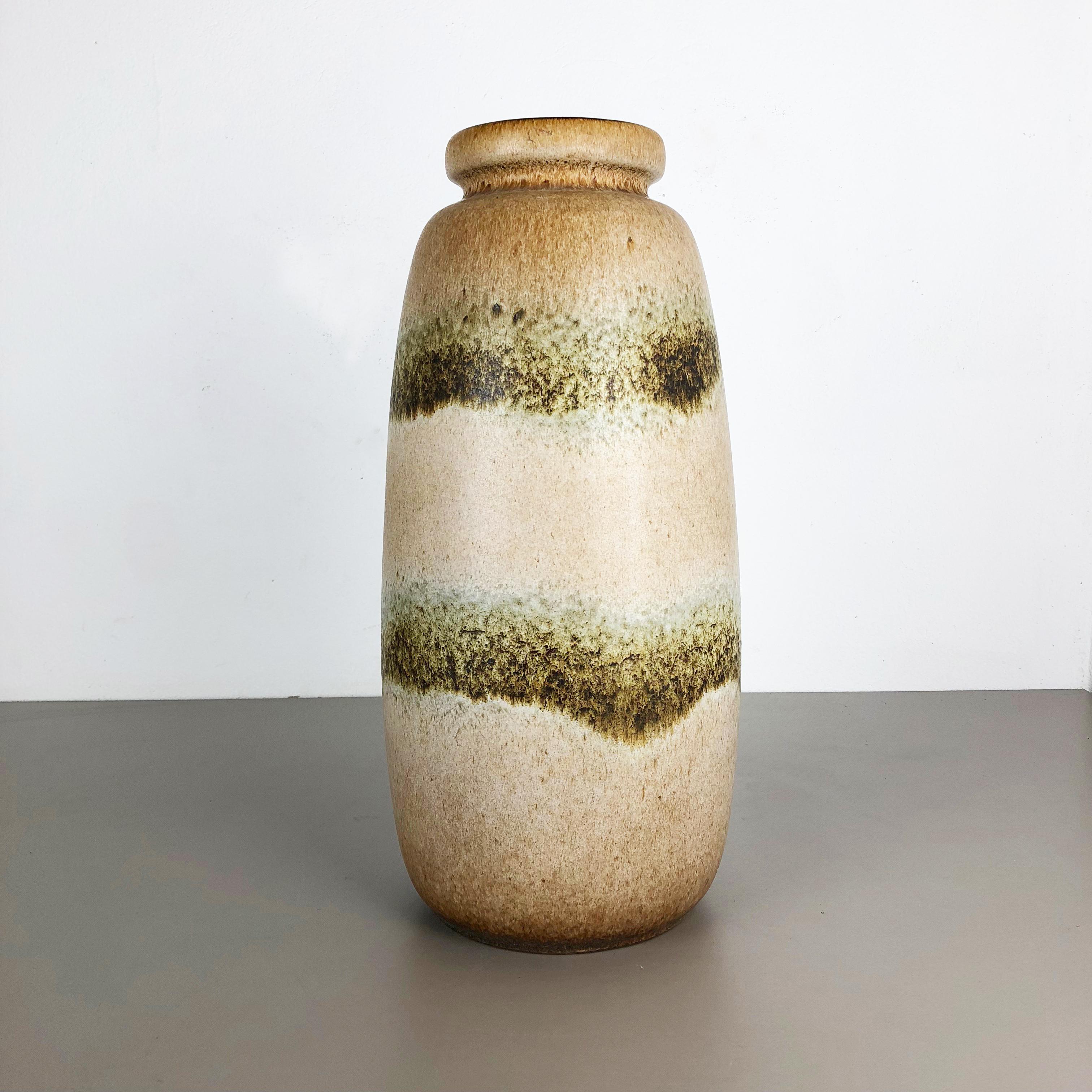 Article:

Fat lava art vase XXXL version


Model: 284-47


Producer:

Scheurich, Germany



Decade:

1970s


Description:

This original vintage vase was produced in the 1970s in Germany. it is made of ceramic pottery in fat