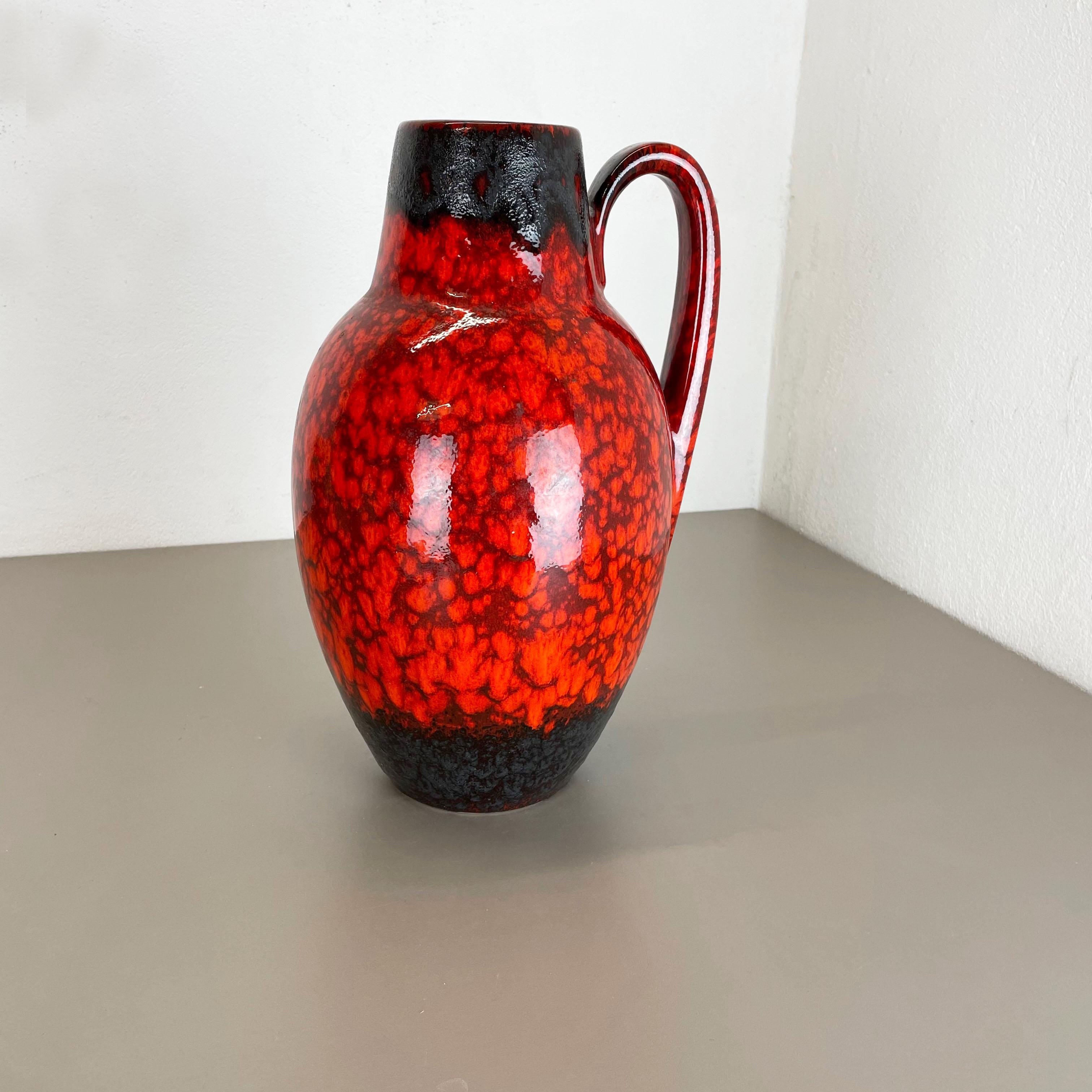 Article:

Fat lava art vase extra large version


Model: 414-38


Producer:

Scheurich, Germany



Decade:

1970s


Description:

This original vintage vase was produced in the 1970s in Germany. It is made of ceramic pottery in