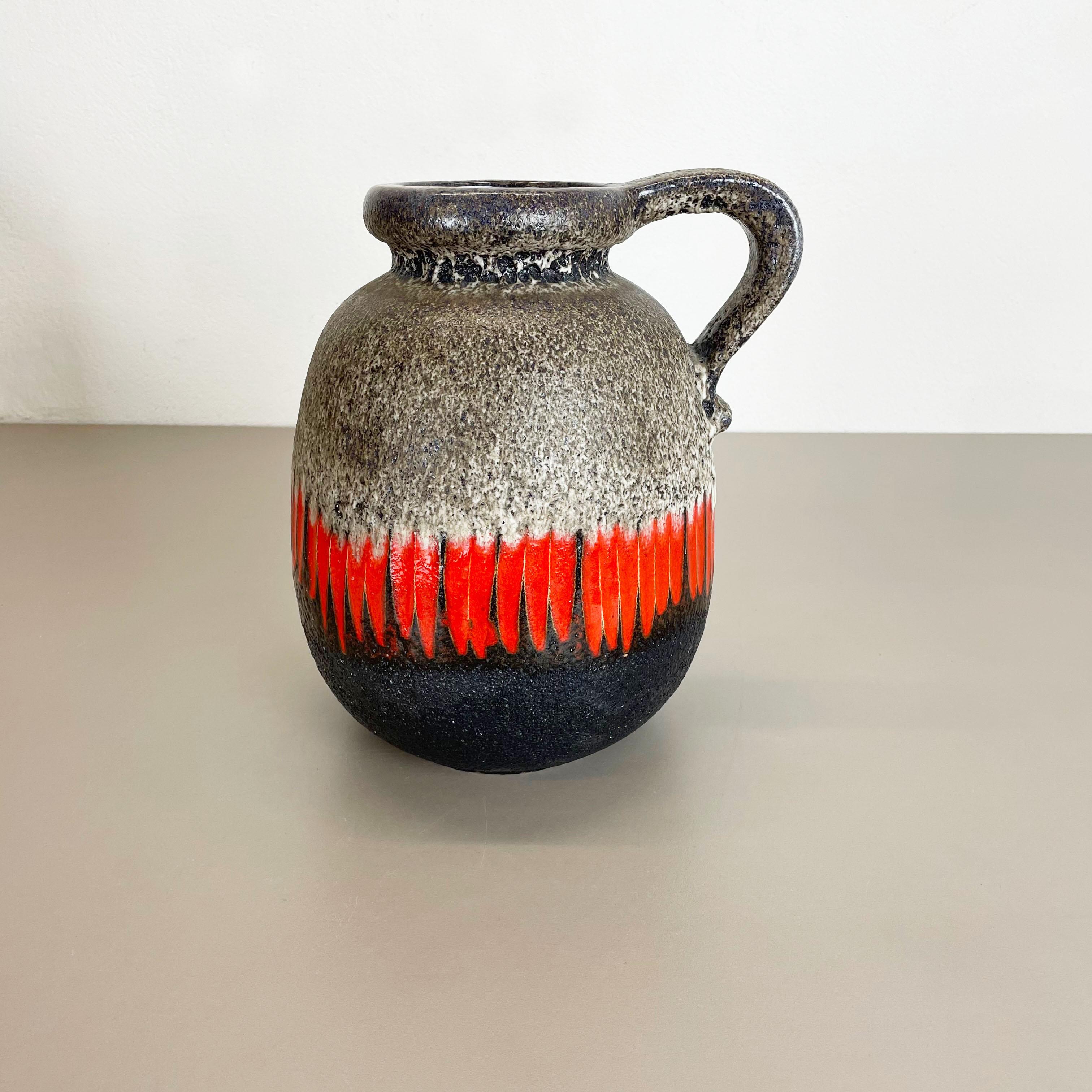 Article:

Fat lava art vase extra large version


Model: 484, see marking on the bottom


Producer:

Scheurich, Germany



Decade:

1970s


Description:

This original vintage vase was produced in the 1970s in Germany. It is