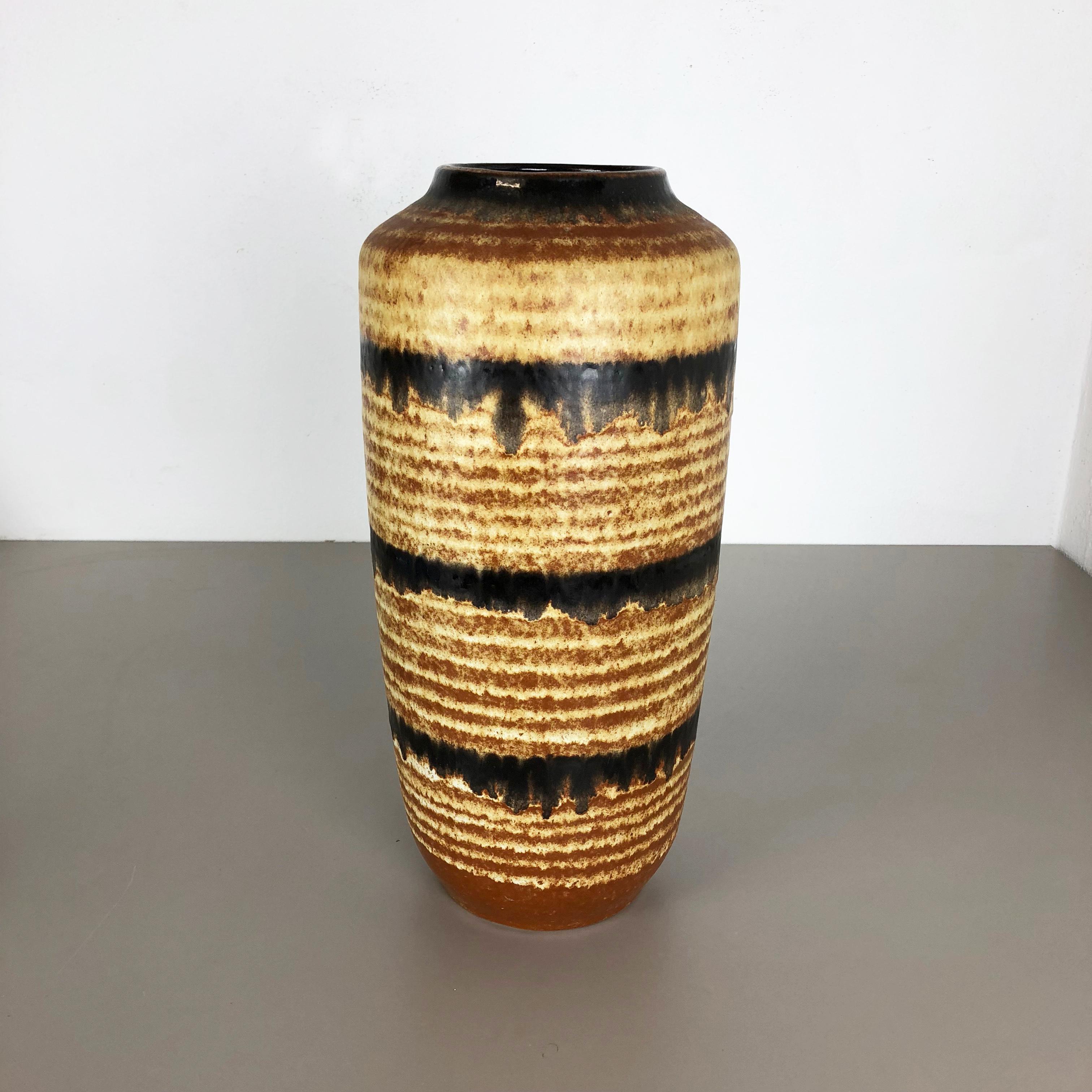 Article:

Fat lava art vase XXXL version


Model: 517-45


Producer:

Scheurich, Germany



Decade:

1970s


Description:

This original vintage vase was produced in the 1970s in Germany. It is made of ceramic pottery in fat