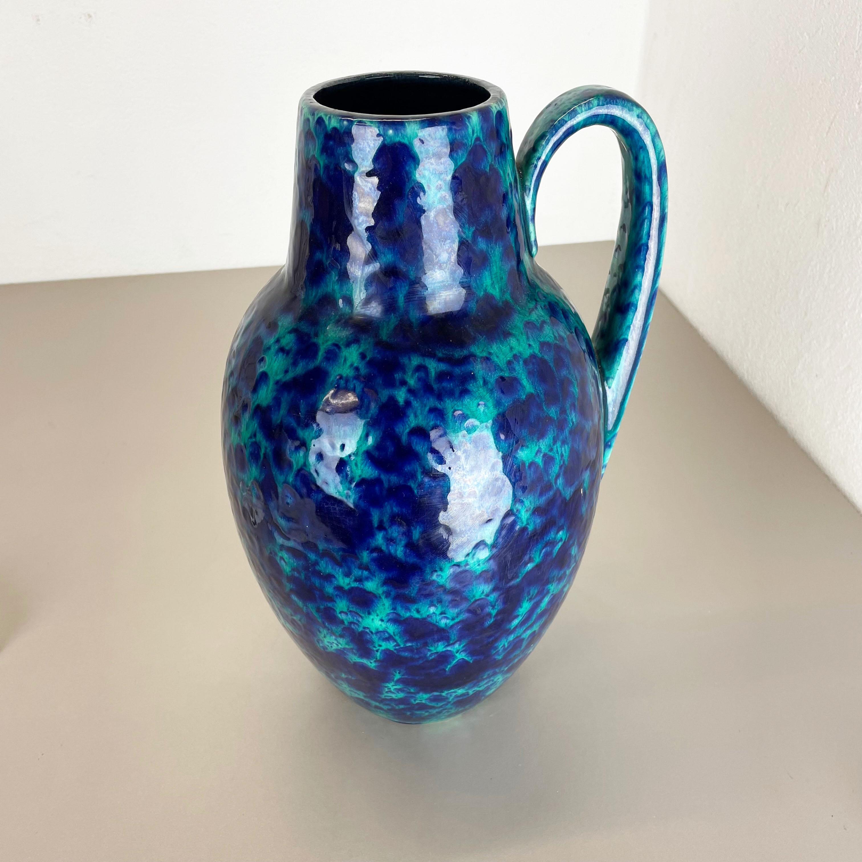 Article:

Fat lava art vase extra large version


Producer:

Scheurich, Germany



Decade:

1970s


Description:

This original vintage vase was produced in the 1970s in Germany. It is made of ceramic pottery in fat lava optic with