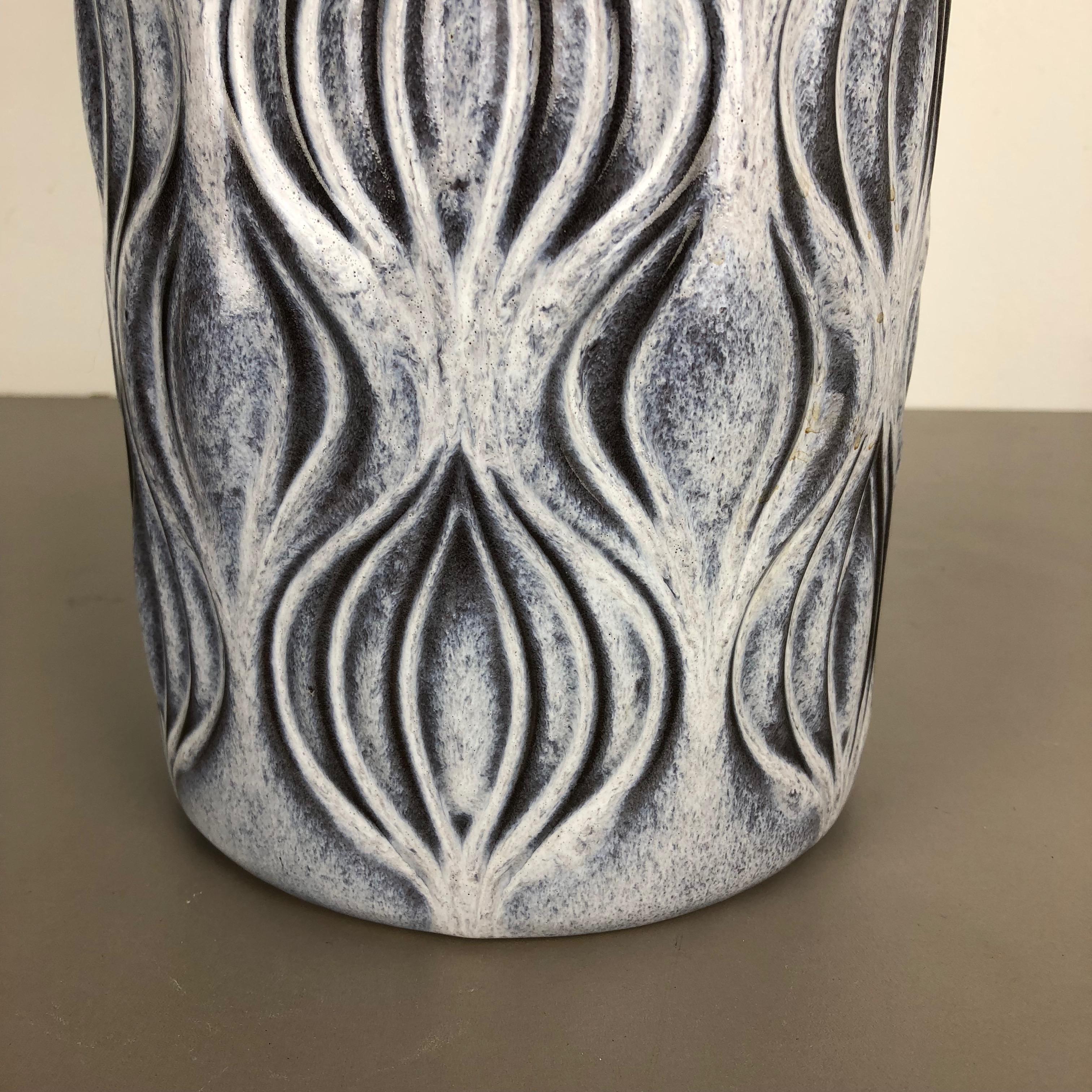 Article:

Fat lava art vase extra large version


Model: 485-45


Producer:

Scheurich, Germany



Decade:

1970s


Description:

This original vintage vase was produced in the 1970s in Germany. It is made of ceramic pottery in fat lava optic with