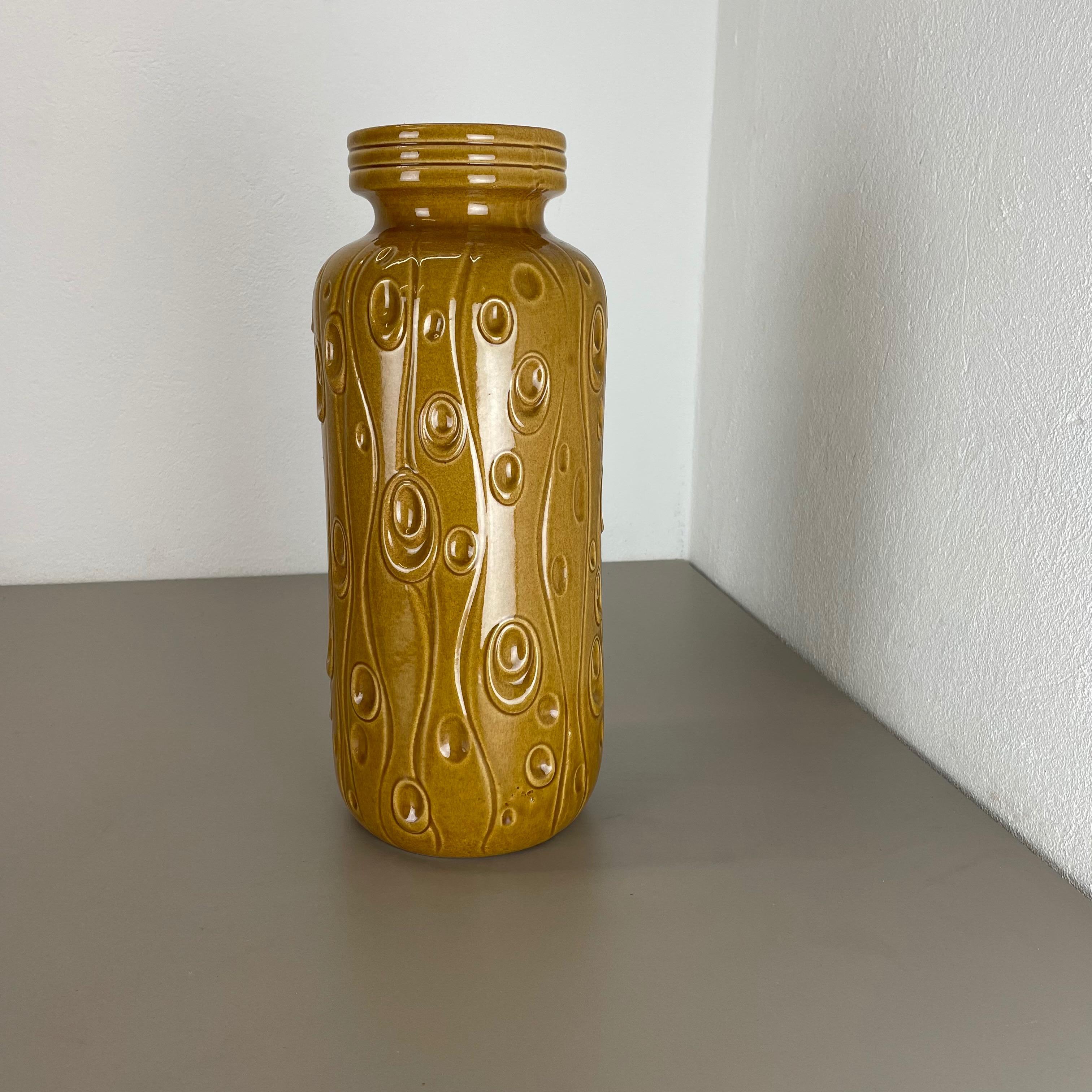 Article:

Fat lava art vase version


Model: 288-40


Producer:

Scheurich, Germany



Decade:

1970s


Description:

This original vintage vase was produced in the 1970s in Germany. It is made of ceramic pottery in fat lava