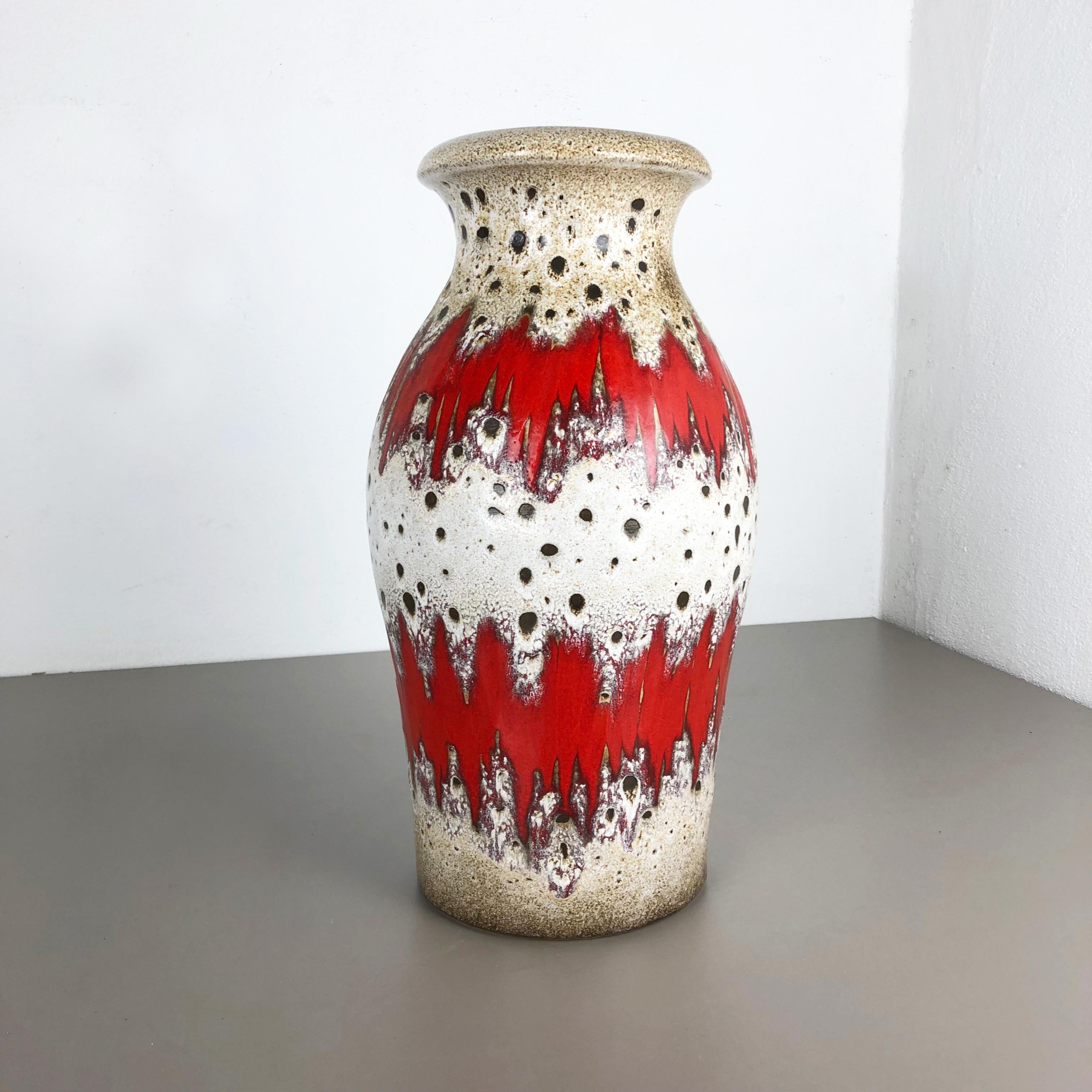 Article:

Fat lava art vase extra large version


Model: 290-40


Producer:

Scheurich, Germany



Decade:

1970s


Description:

This original vintage vase was produced in the 1970s in Germany. It is made of ceramic pottery in