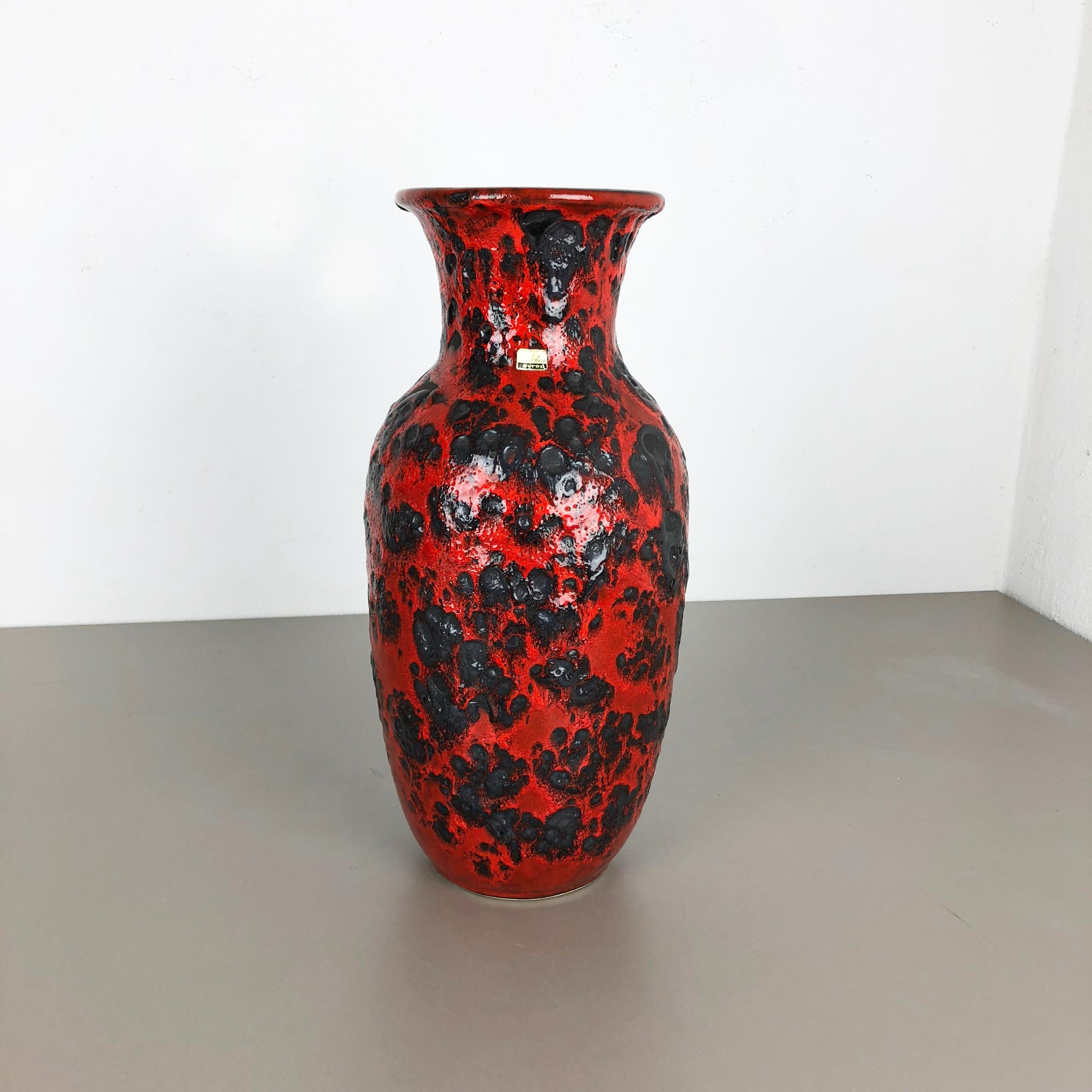 Article:

Fat lava art vase extra large version


Model: 239-41


Producer:

Scheurich, Germany



Decade:

1970s




This original vintage vase was produced in the 1970s in Germany. It is made of ceramic pottery in fat lava