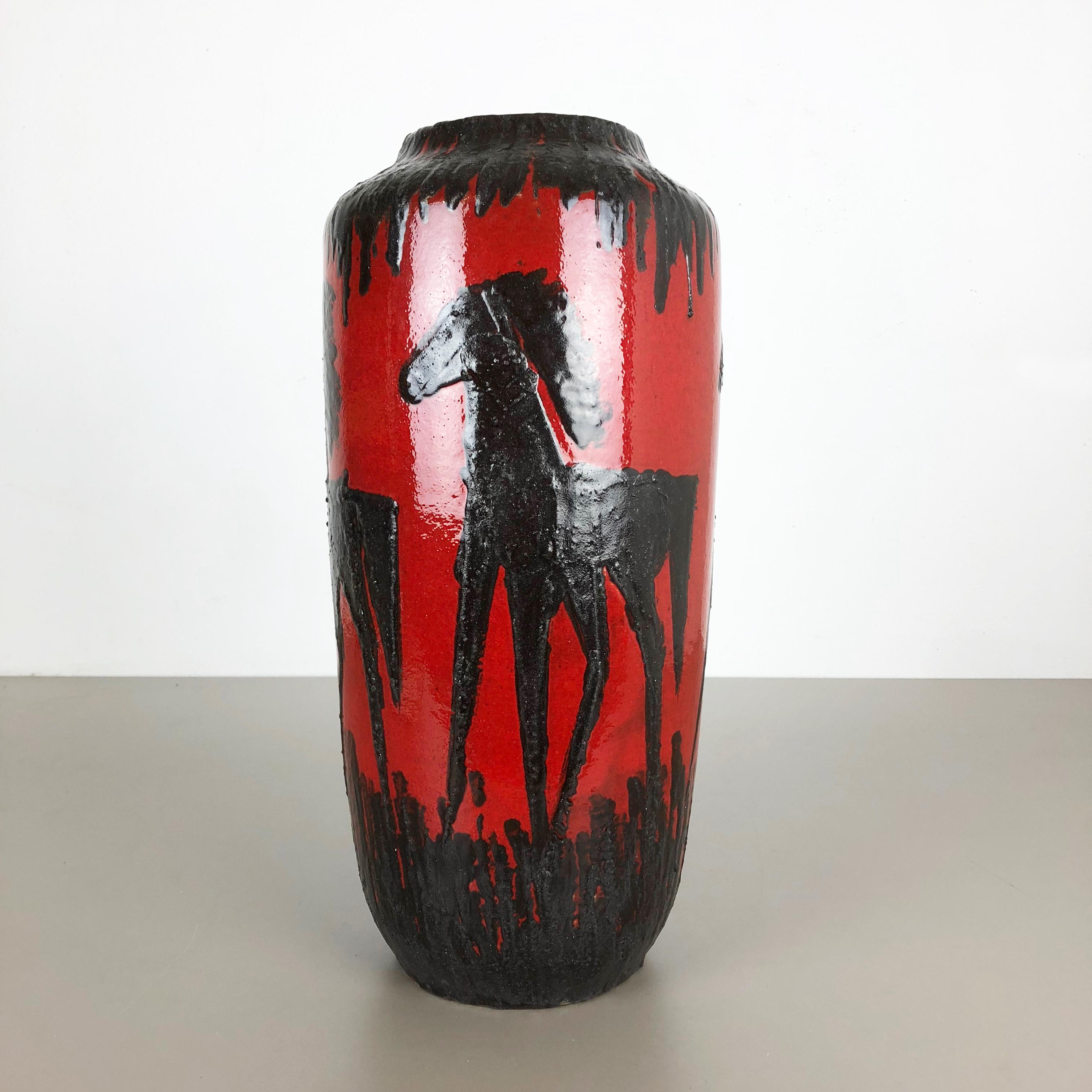 Article:

Fat lava art vase extra large version with abstract horses


Model: 517-45


Producer:

Scheurich, Germany



Decade:

1970s


Description:

This original vintage vase was produced in the 1970s in Germany. It is made