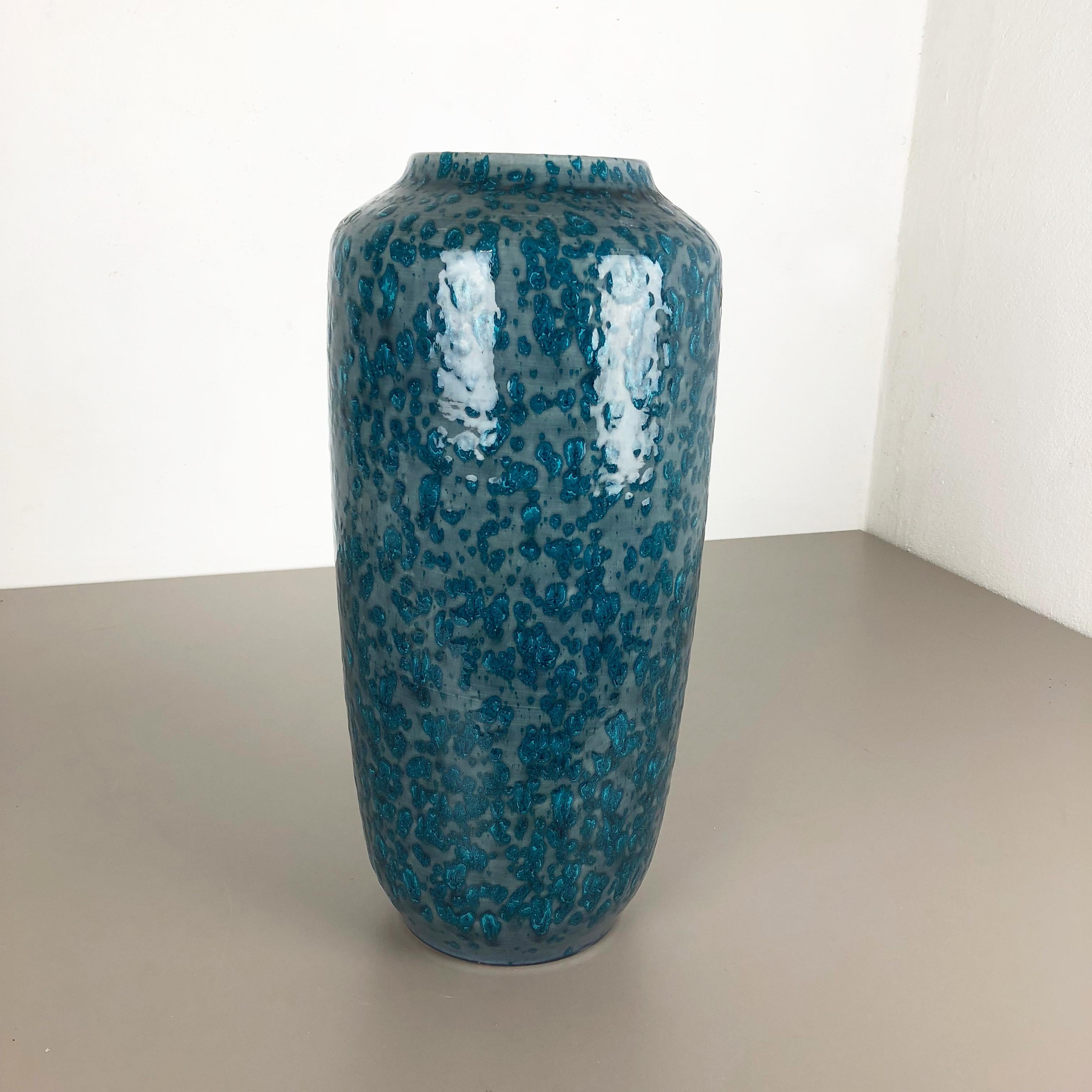 Article:

Fat lava art vase extra large version


Model: 517-45


Producer:

Scheurich, Germany



Decade:

1970s


This original vintage vase was produced in the 1970s in Germany. It is made of ceramic pottery in fat lava optic