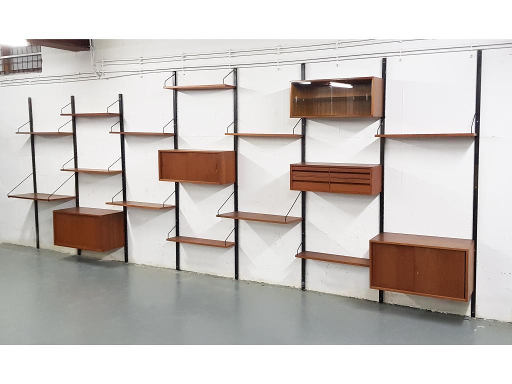 Large Danish design wall system or shelving unit by Poul Cadovius for Royal System, designed in Denmark in 1948.

When you ask someone to think of an European midcentury wall unit, most will probably think of Poul Cadovius and his shelving system.