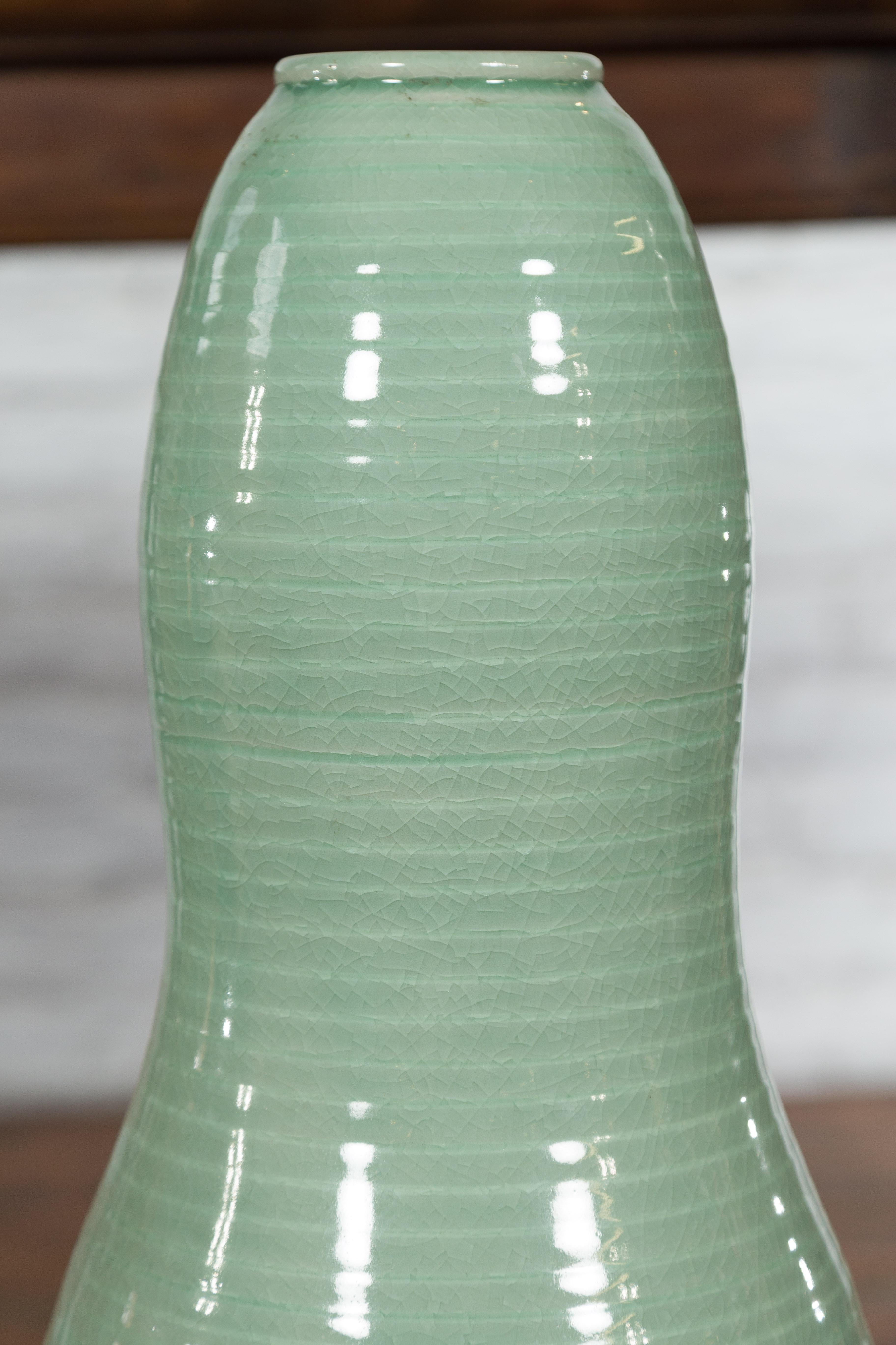 Tall Gourd Shaped Vase with Soft Green Glaze and Sculptural Silhouette in vendita 1