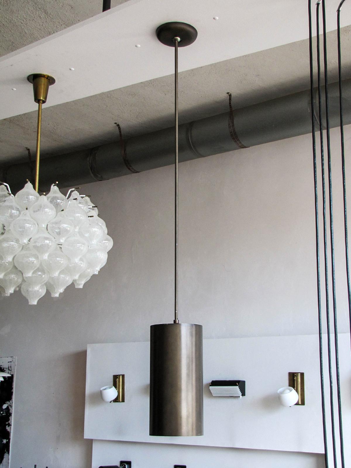stunning large scale cylindrical pendants in black/olive colored brushed anodized aluminum pendants by Prescolite, total drop: 50 inches, can be customized, wired for US standards, one E26 socket per fixture, max. wattage 100w or LED equivalent,