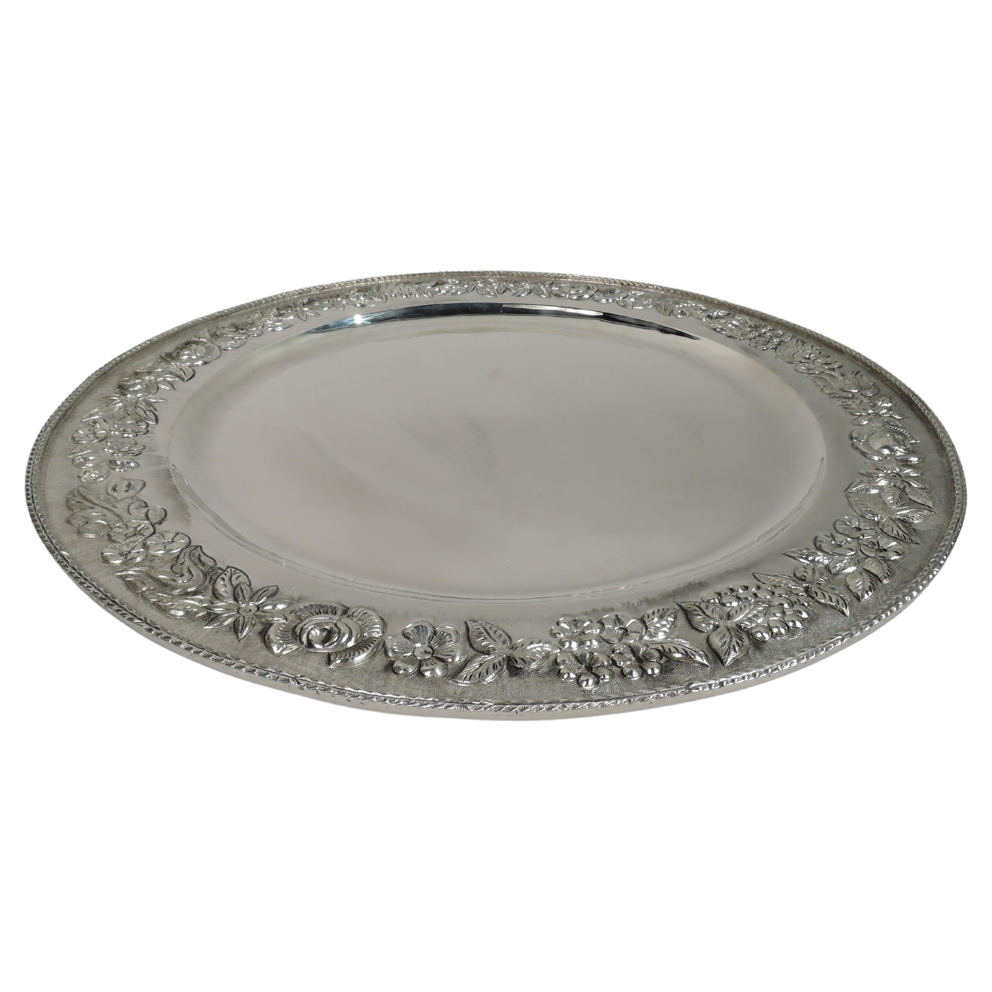 Large & Pretty Silver 16-Inch Round Tray with Repousse Floral Garland For Sale