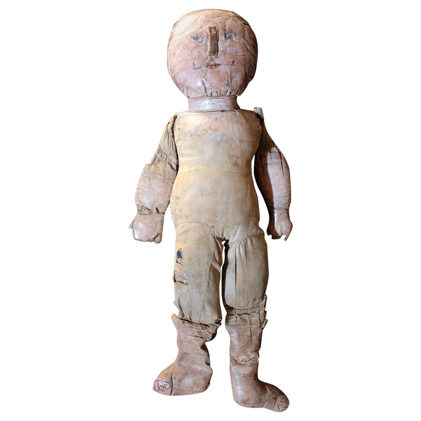 Large Primitive Oil-Cloth Hand-Stitched Doll, circa 1900