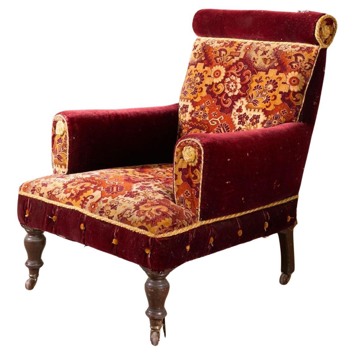 Grand fauteuil du 19ème siècle recouvert de tapis