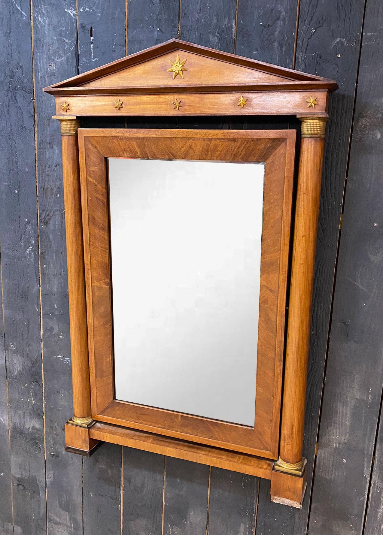 large psyche mirror in walnut and bronze Empire style, circa 1900.
 