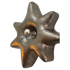 Large Puffy Star Sconce by Eny Lee Parker