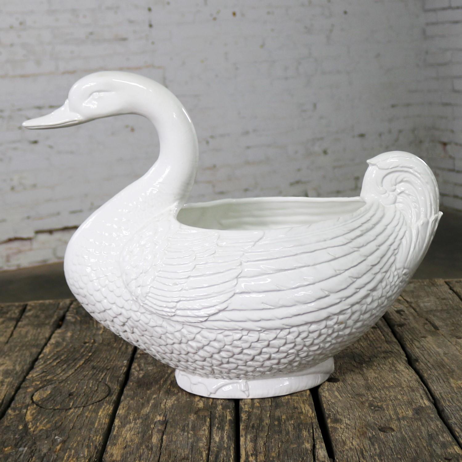 Handsome porcelain large pure white swan figural jardinière planter or serving tureen. It is in wonderful vintage condition with a couple small glaze chips, but no cracks, or crazing that we have detected. Please see photos. Circa mid-20th