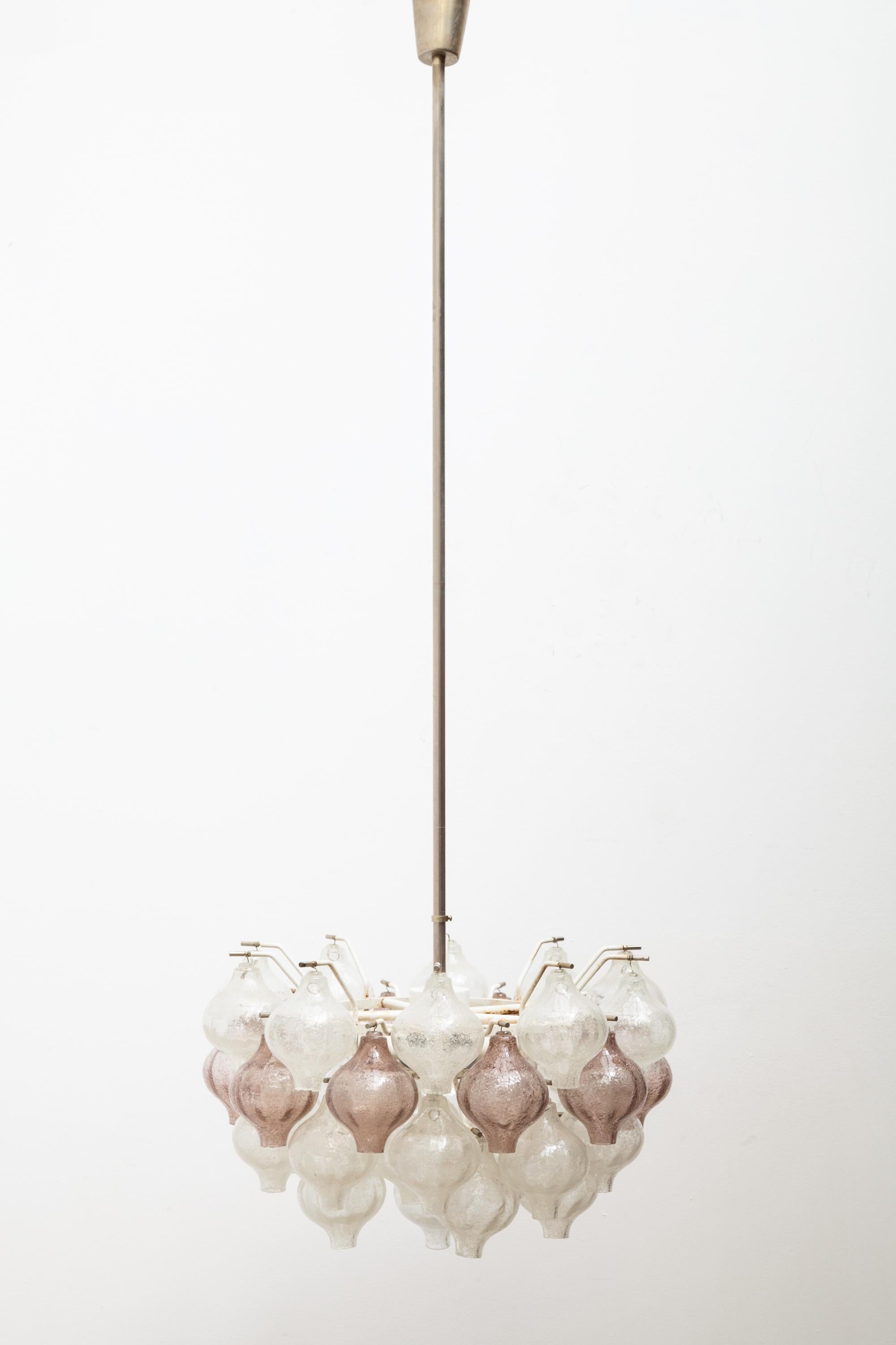 Rare handblown purple and clear bubble “Tulipan” glass chandelier with metal frame and brass parts.
These glass tulip bulbs are made with small bubbles inside the glassonions the technique is named Pulegoso.


Founded in Vienna by Julius August