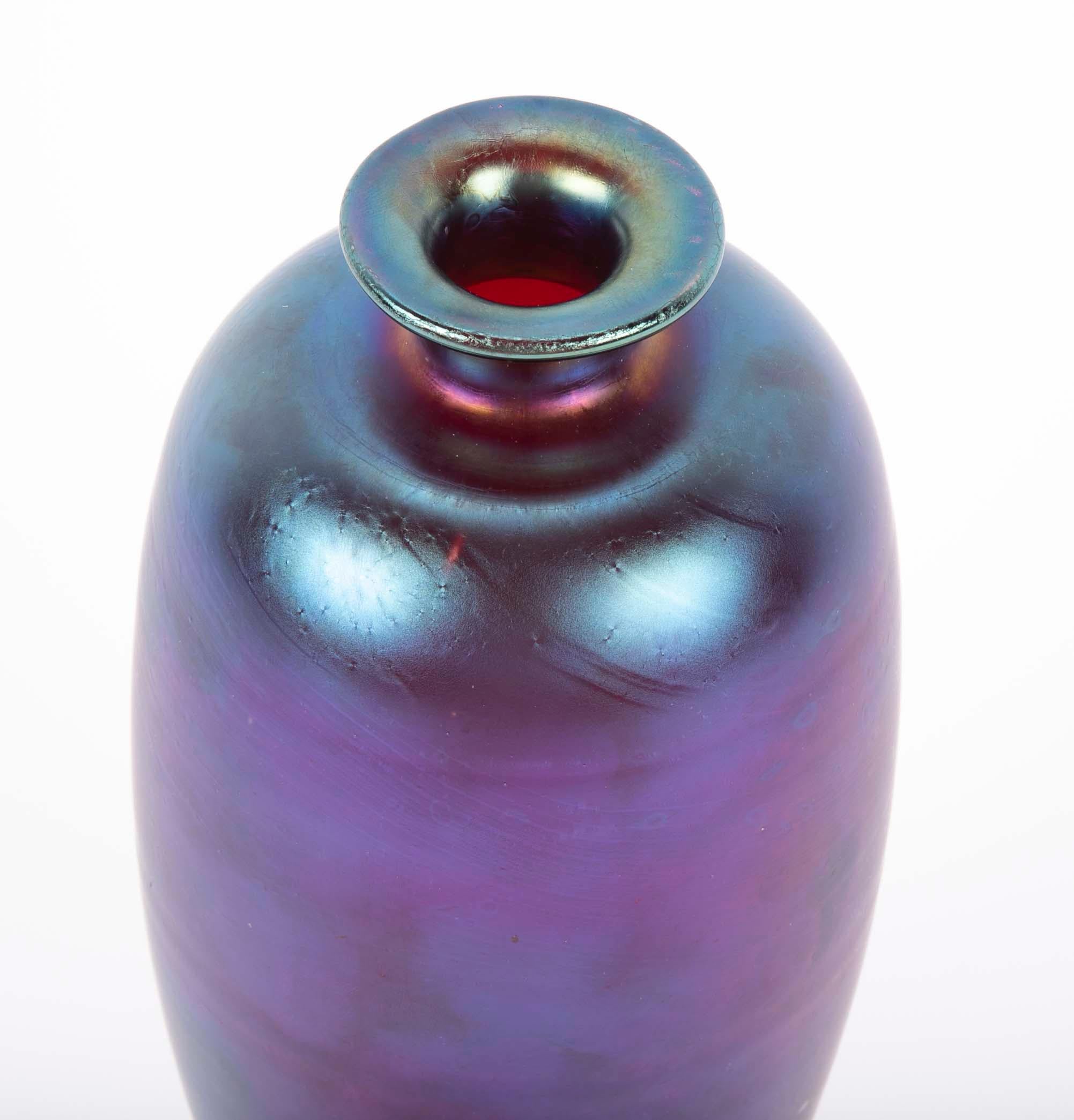 A frosted iridescent and purple Loetz vase.