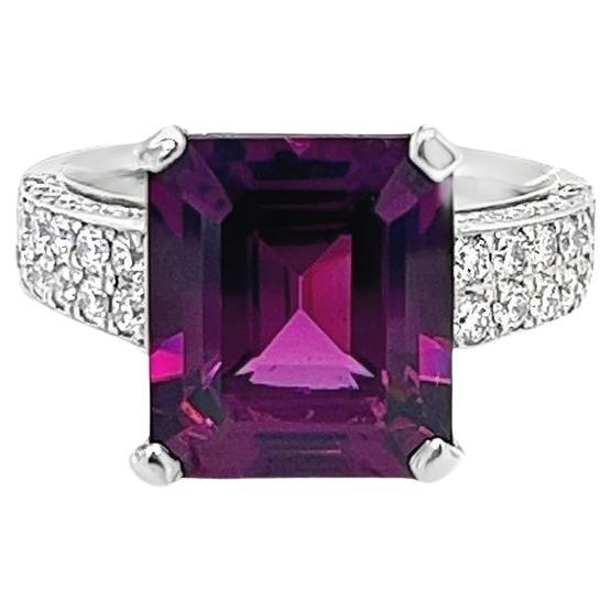 Large purple garnet cocktail ring with diamond accents set in platinum