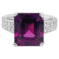 Large purple garnet cocktail ring with diamond accents set in platinum