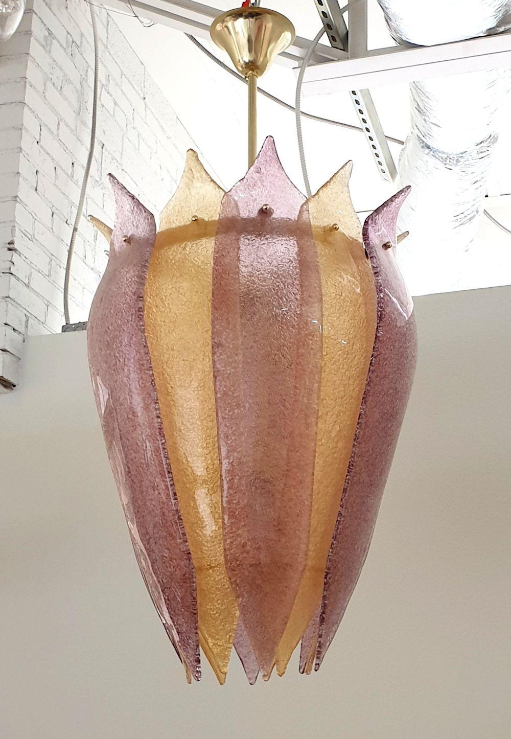 Large Murano glass two tones lantern or chandelier, Italy, circa 2010s.
The large chandelier is made of purple and gold color Murano glass pieces, over a brass and gold plated frame.
The lantern has a kind of tulip shape.
Fits in a Mid Century