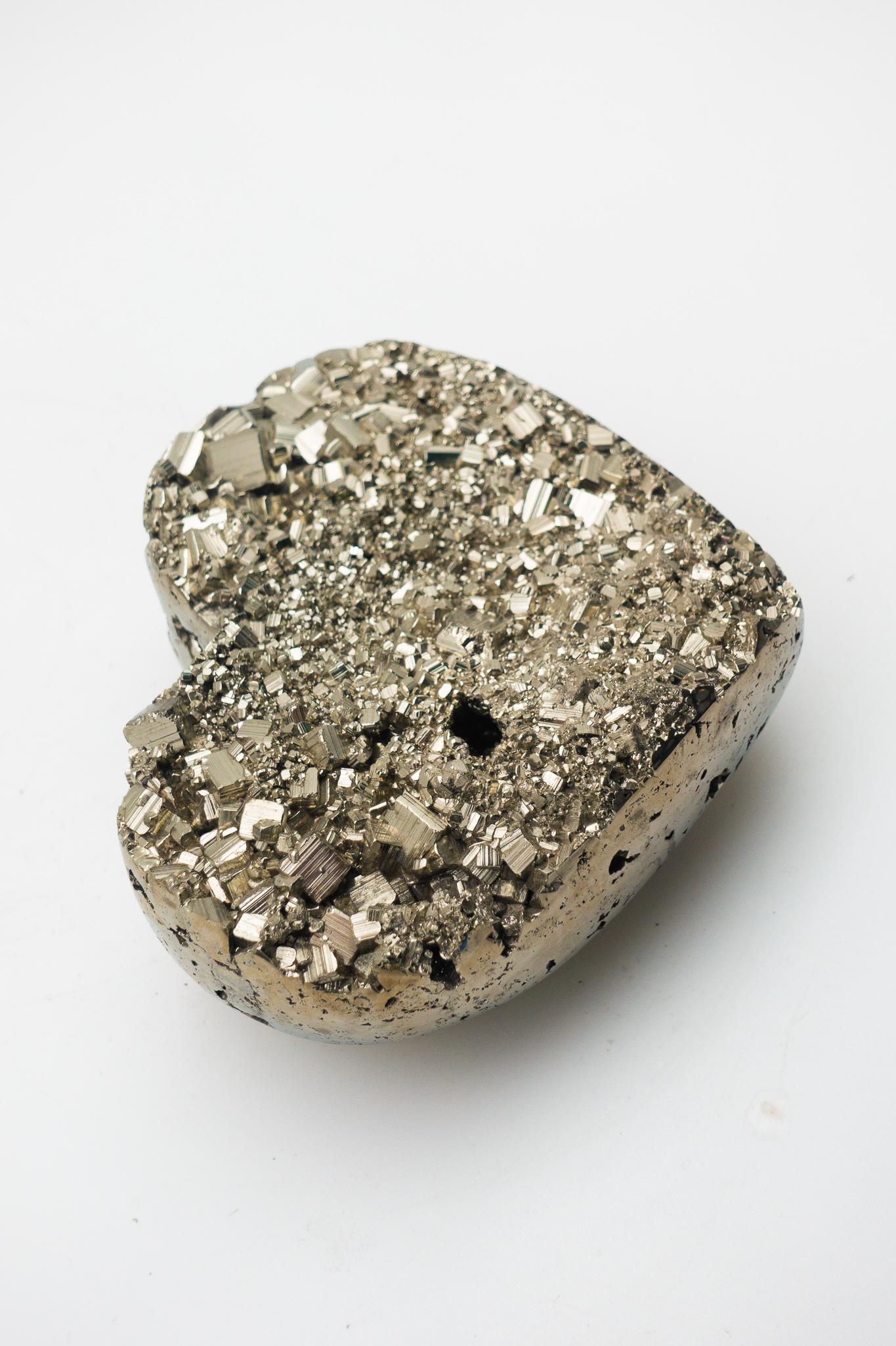 Beautifully carved pyrite specimen from Peru. Pyrite is a symbol of prosperity and good luck. The ideal gift for Valentines Day - love, prosperity and good luck!