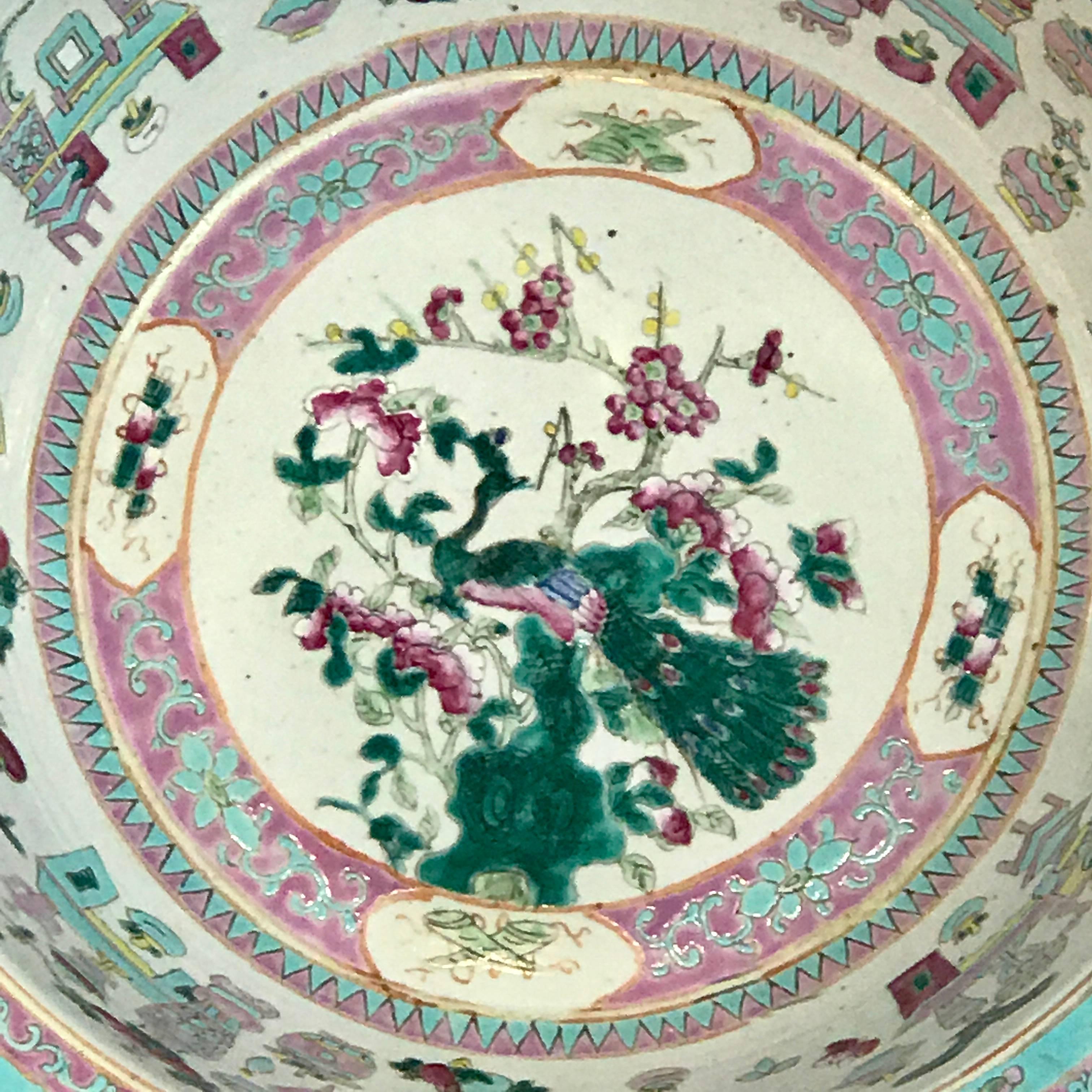 Large Qing dynasty Famille Verte peacock and vase motif bowl, beautifully decorated with 13