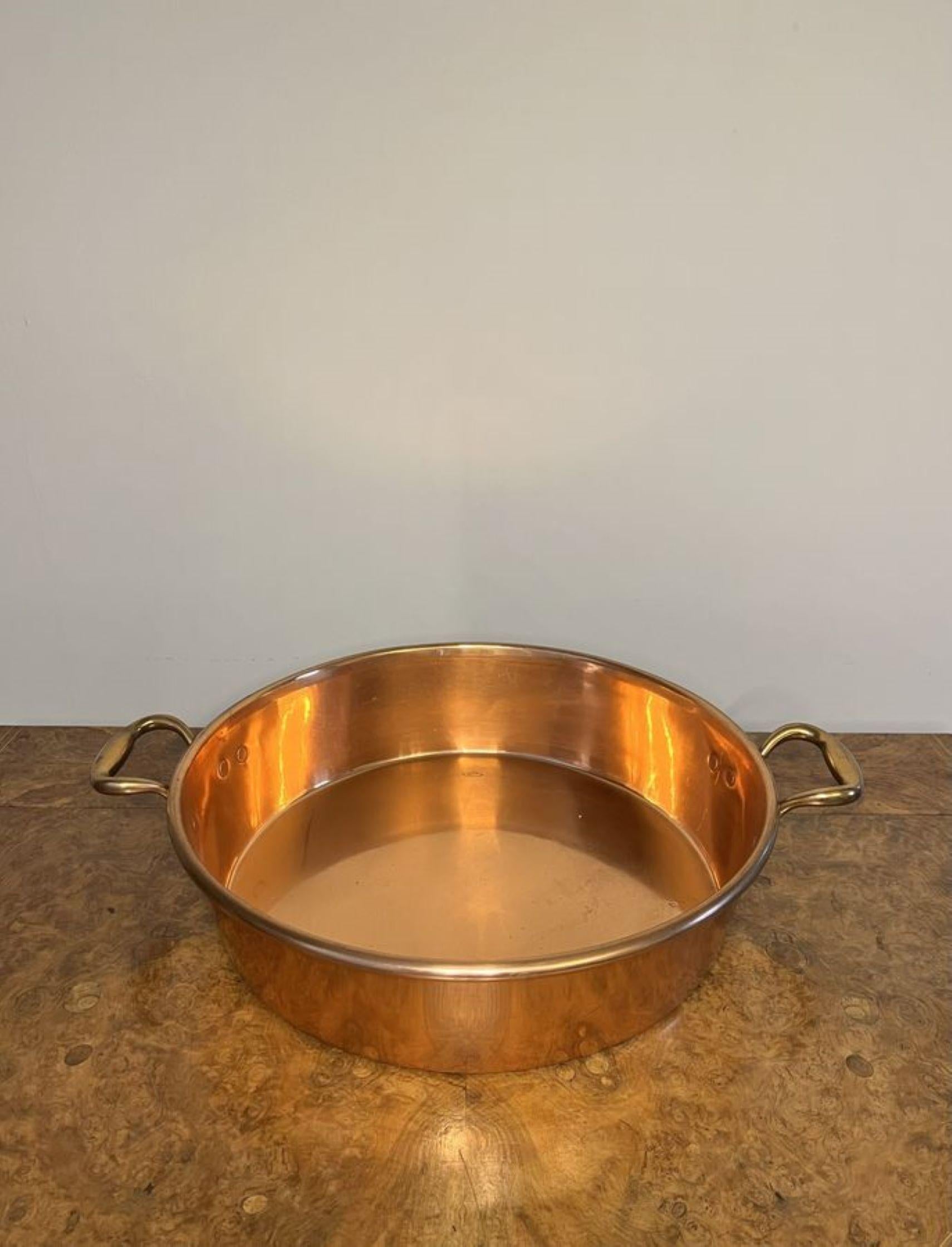 Large quality antique George III copper pan having a quality large antique George III copper pan with shaped handles to both sides. 

D. 1800
