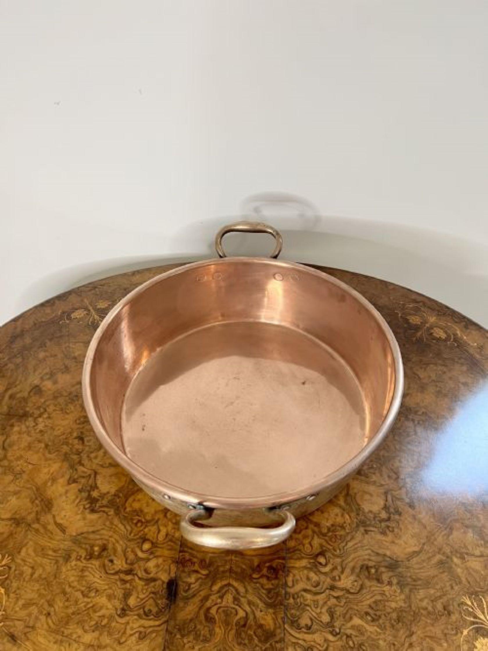Large quality antique Victorian Hodges & Sons copper pan having a large copper twin handled pan stamped 'Hodges and Sons Dublin' to the front as shown and stamp number to one handle '17'