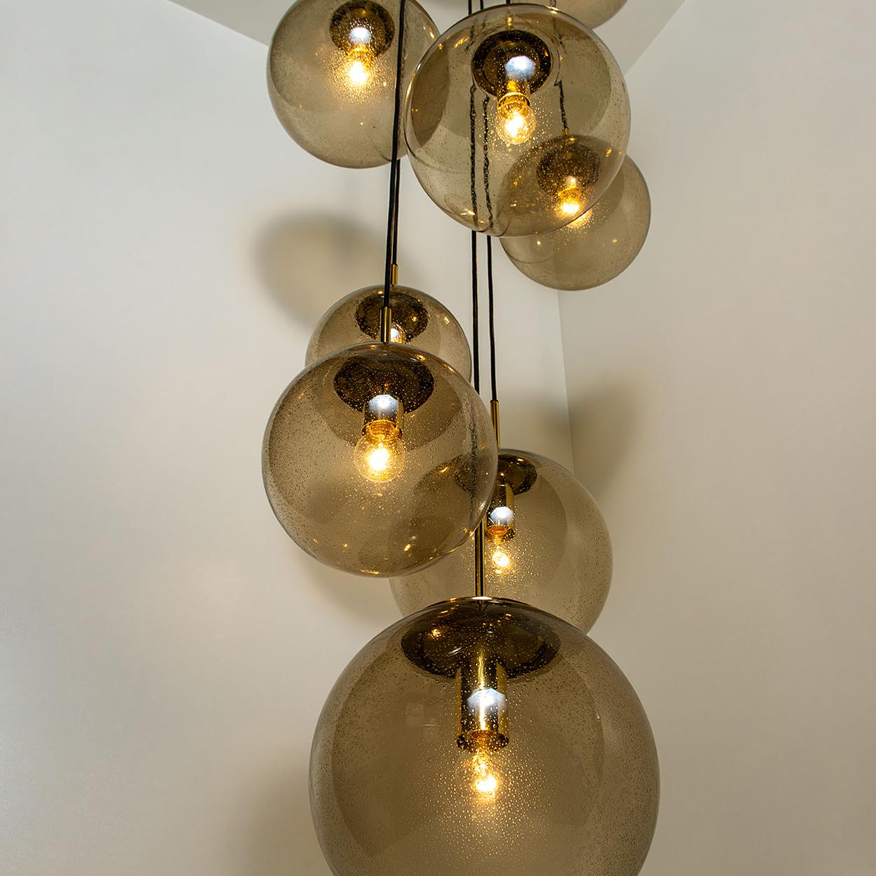 Brass Large Quantity Smoked Blown Globes by Glashütte Limburg, Four Sizes For Sale