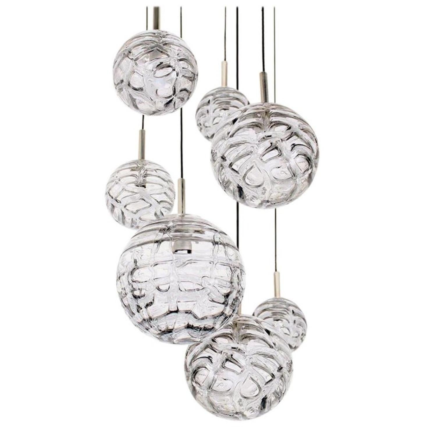 1 of the 7 stunning Murano glass globes. Outstanding high- end quality design with an amazing color. High-end hand blown heavy glass spheres.
A statement piece in the any room. Wonderful light effect due to lovely glass elements.

The price is per
