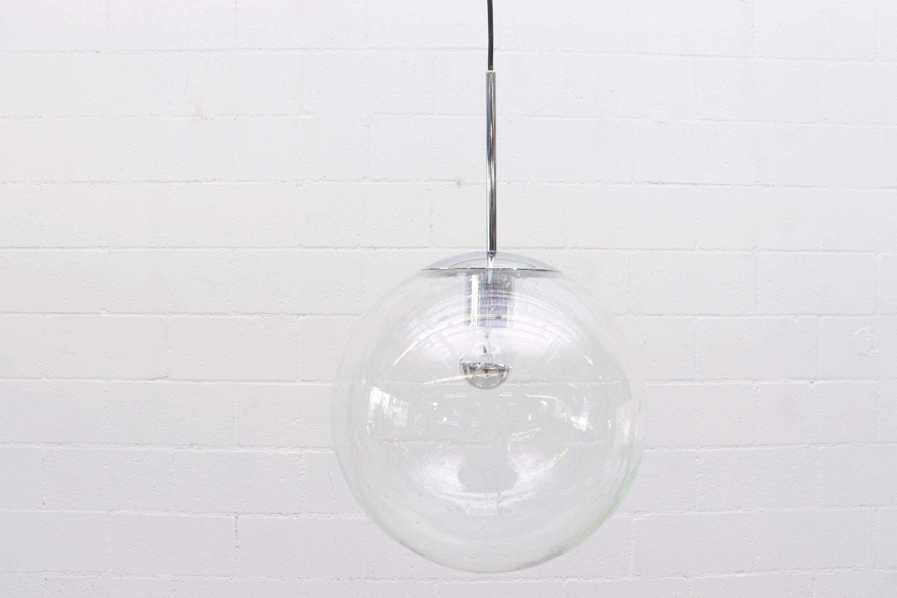 Large Raak Clear Glass Globe with Chrome Hardware and Black Cord In Good Condition For Sale In Los Angeles, CA