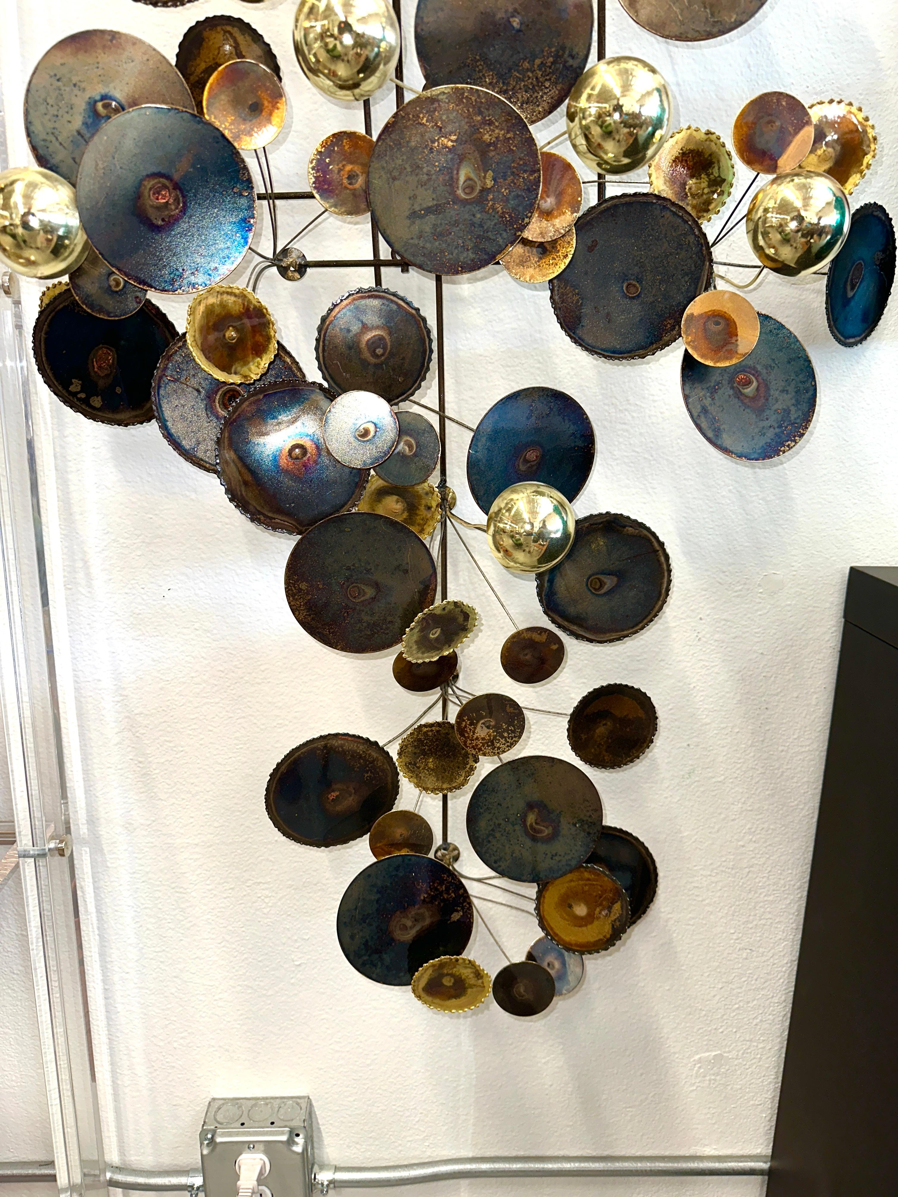 A nice Wall Mounted Raindrops sculpture. Likely by Curtis Jere although the signature has long worn away, hence the attribution. It can be mounted either horizontally or vertically, there are mounts to do so either way on back. In good overall