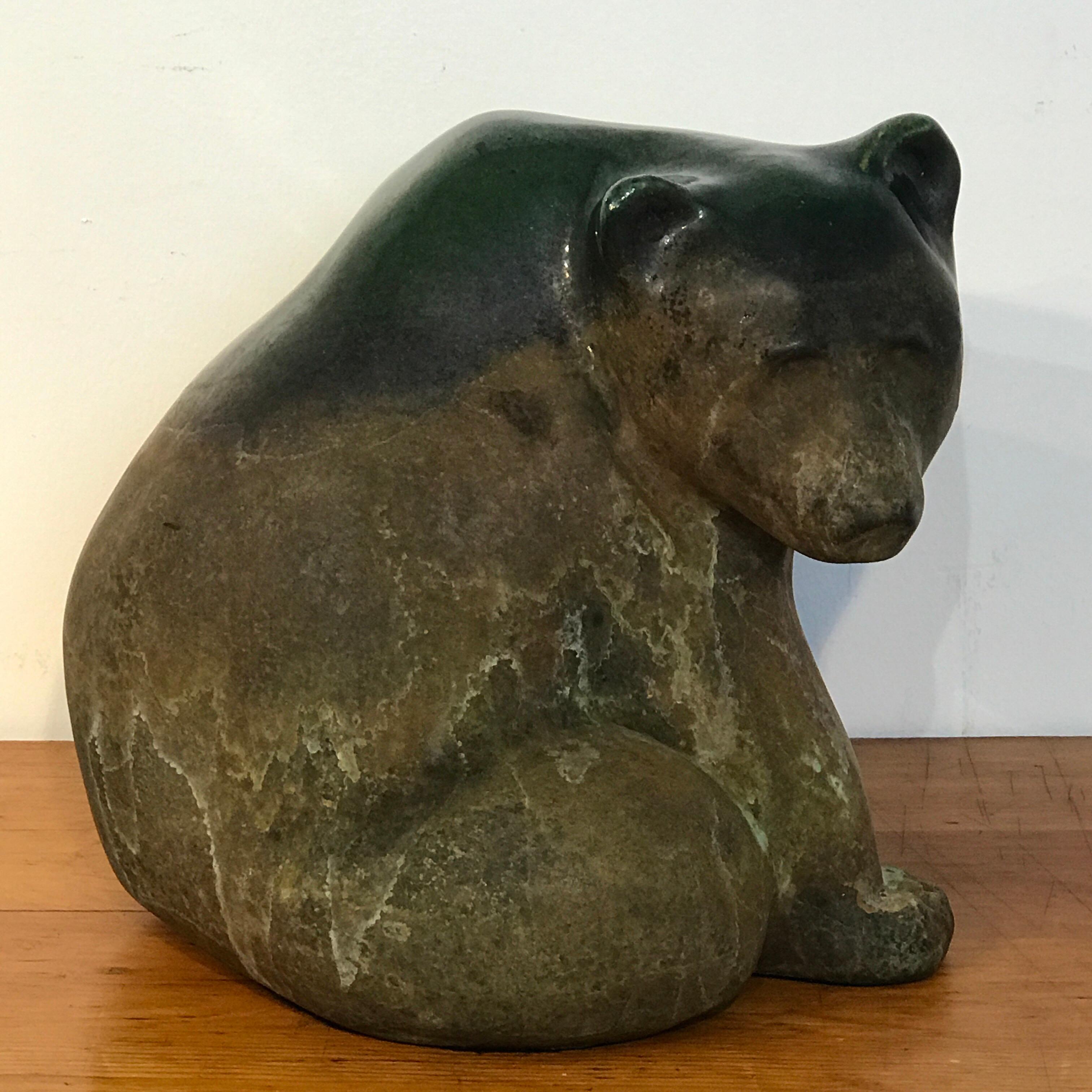 Large Raku pottery seated bear by Tony Evans, exceptional colors and glaze techniques.