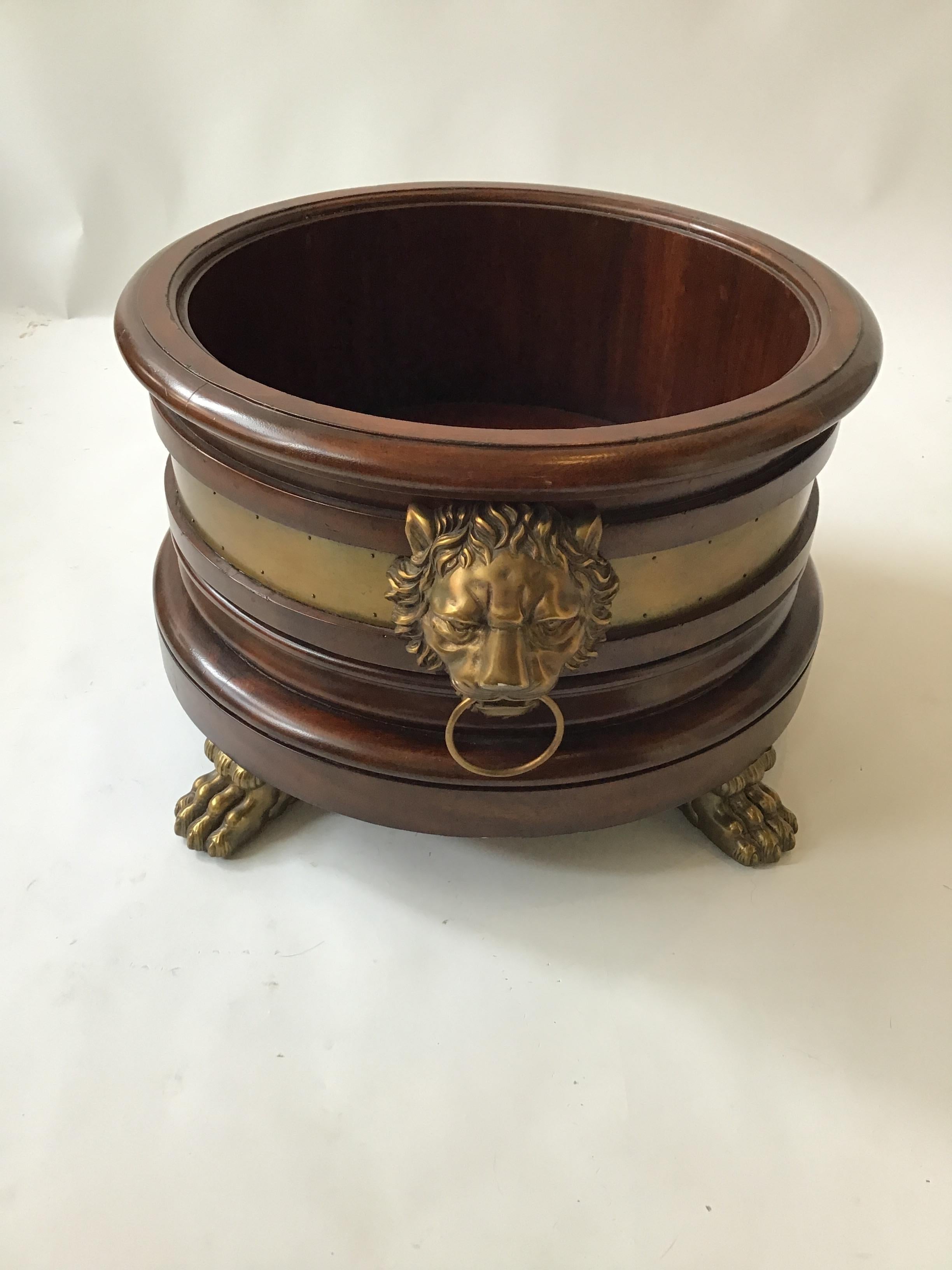 Ralph Lauren Wood and brass lion head planter. From a celebrities Southampton, NY oceanfront estate.