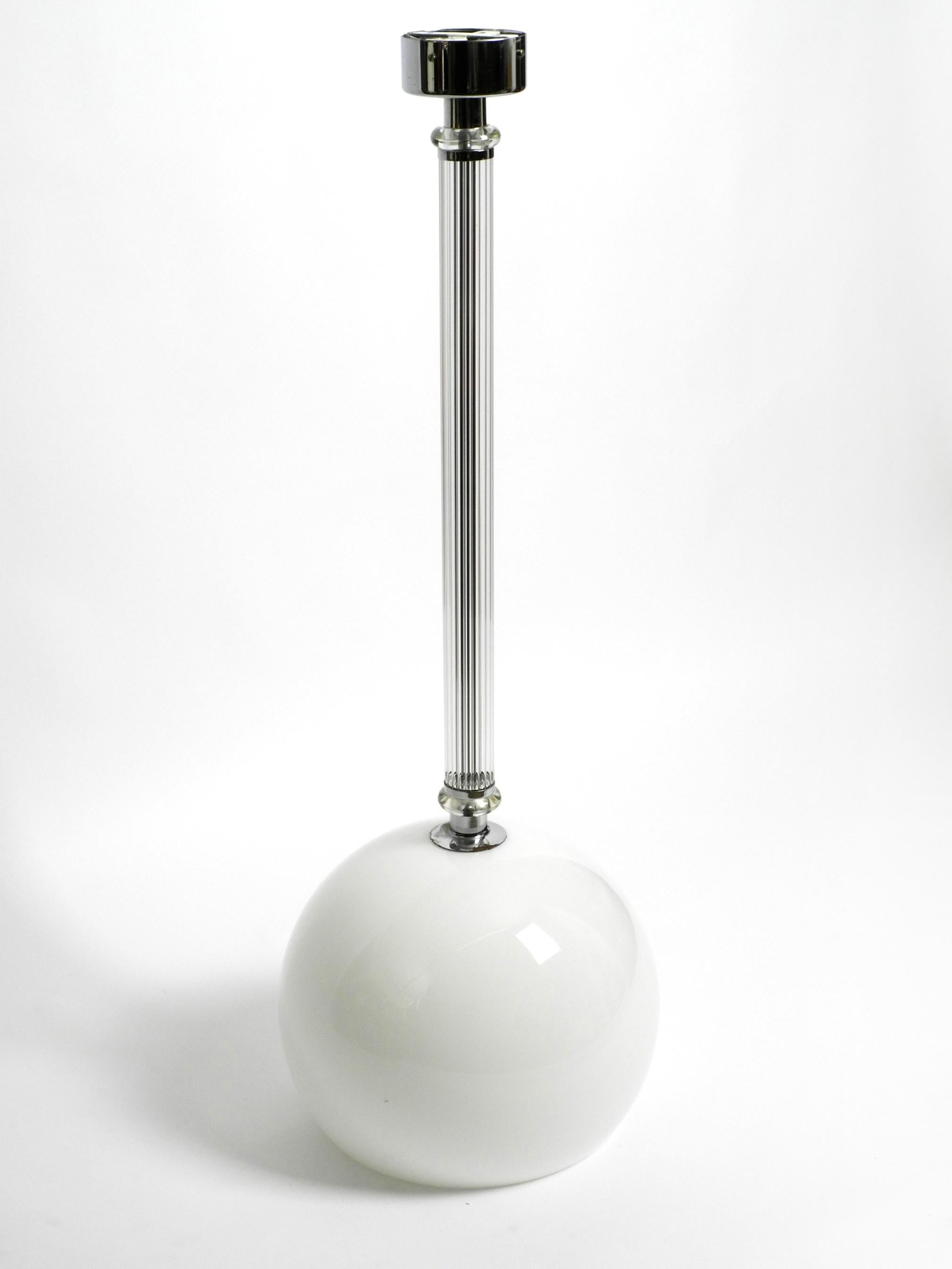 Large rare Czech mid century glass ceiling lamp with glass shade and glass rod.
Very nice Minimalist 50s design.
The shade is made of thick, heavy frosted glass, 
the rod is made of chrome-plated metal and glass around the outside.
Makes a great