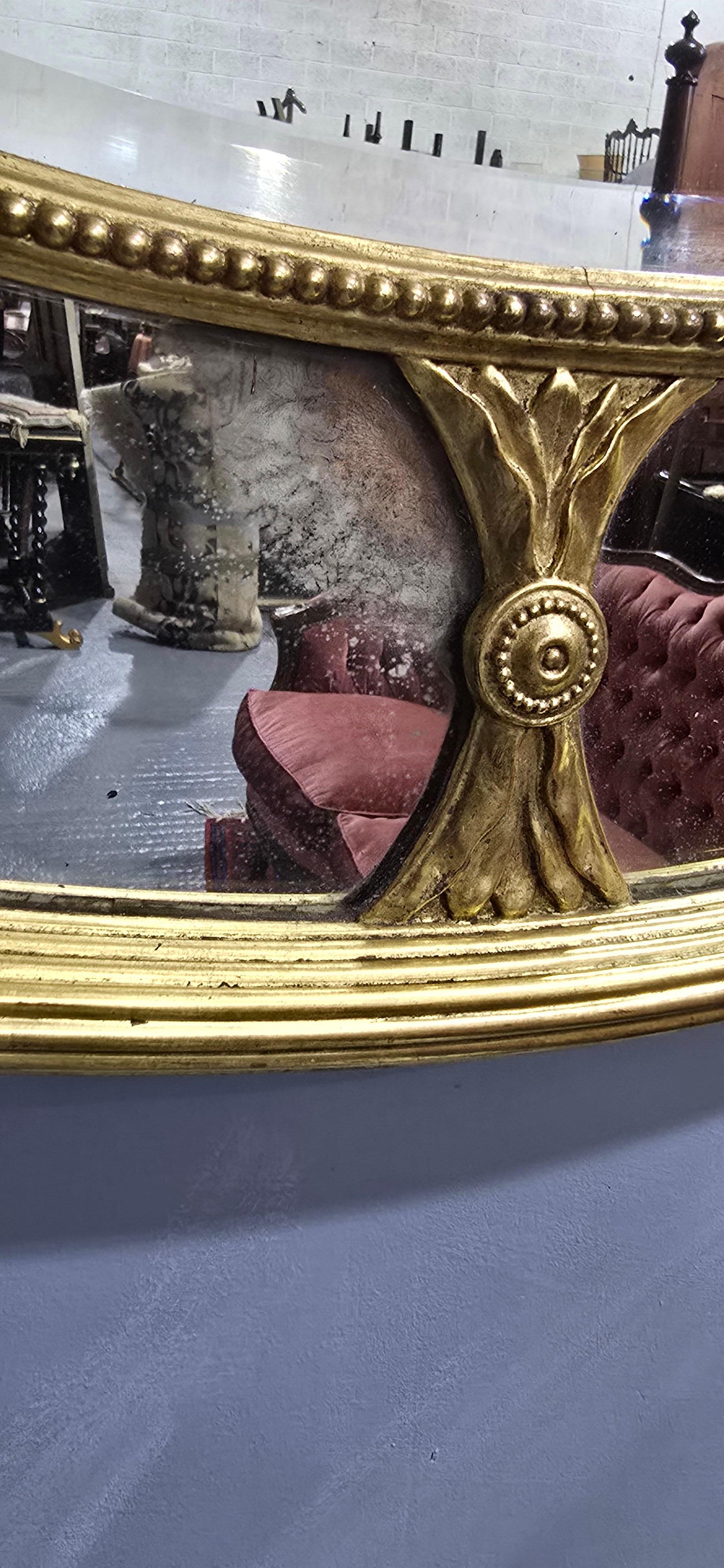 Grande e raro specchio ovale dorato inglese Chippendale in vendita 2