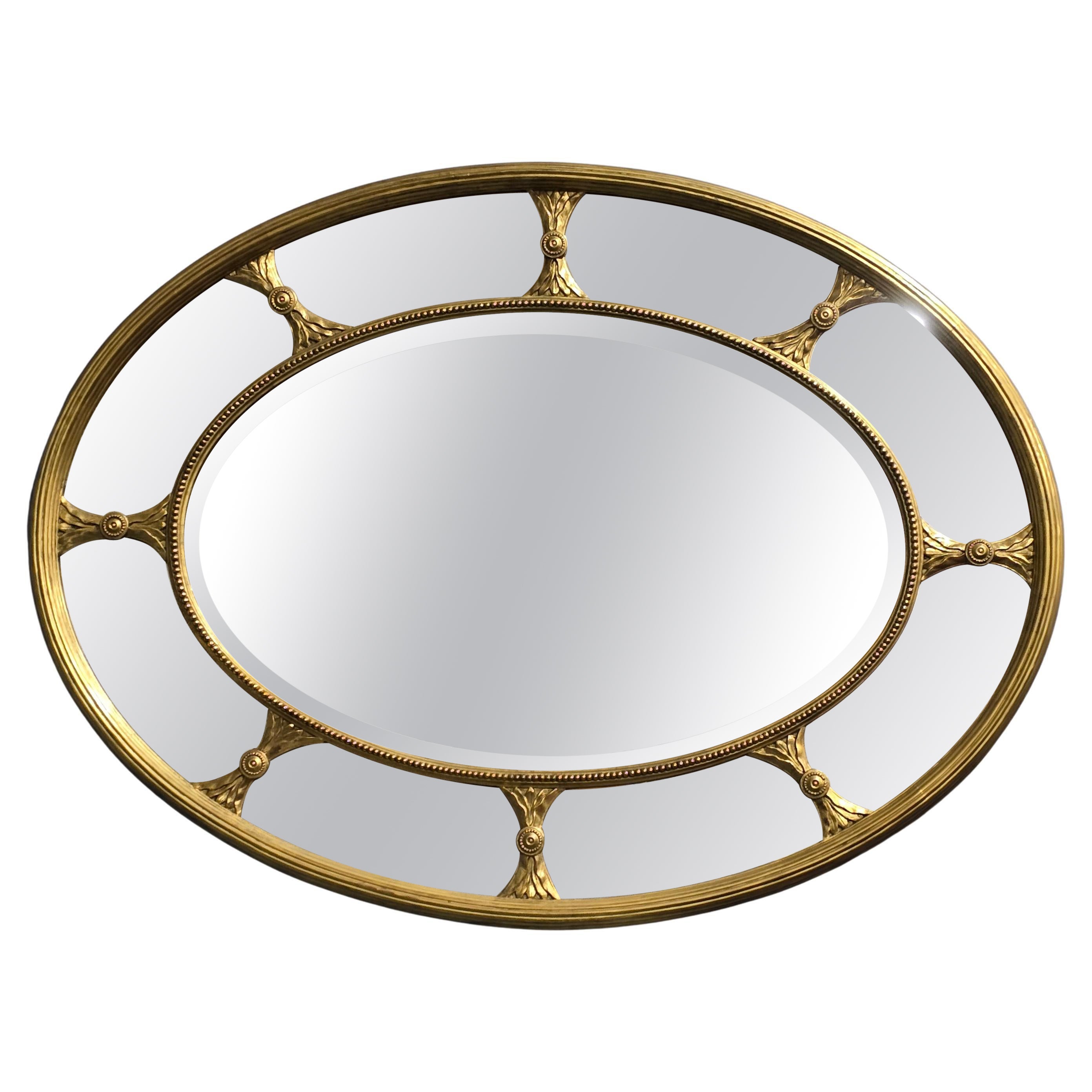 Grand miroir ovale doré anglais Chippendale rare en vente