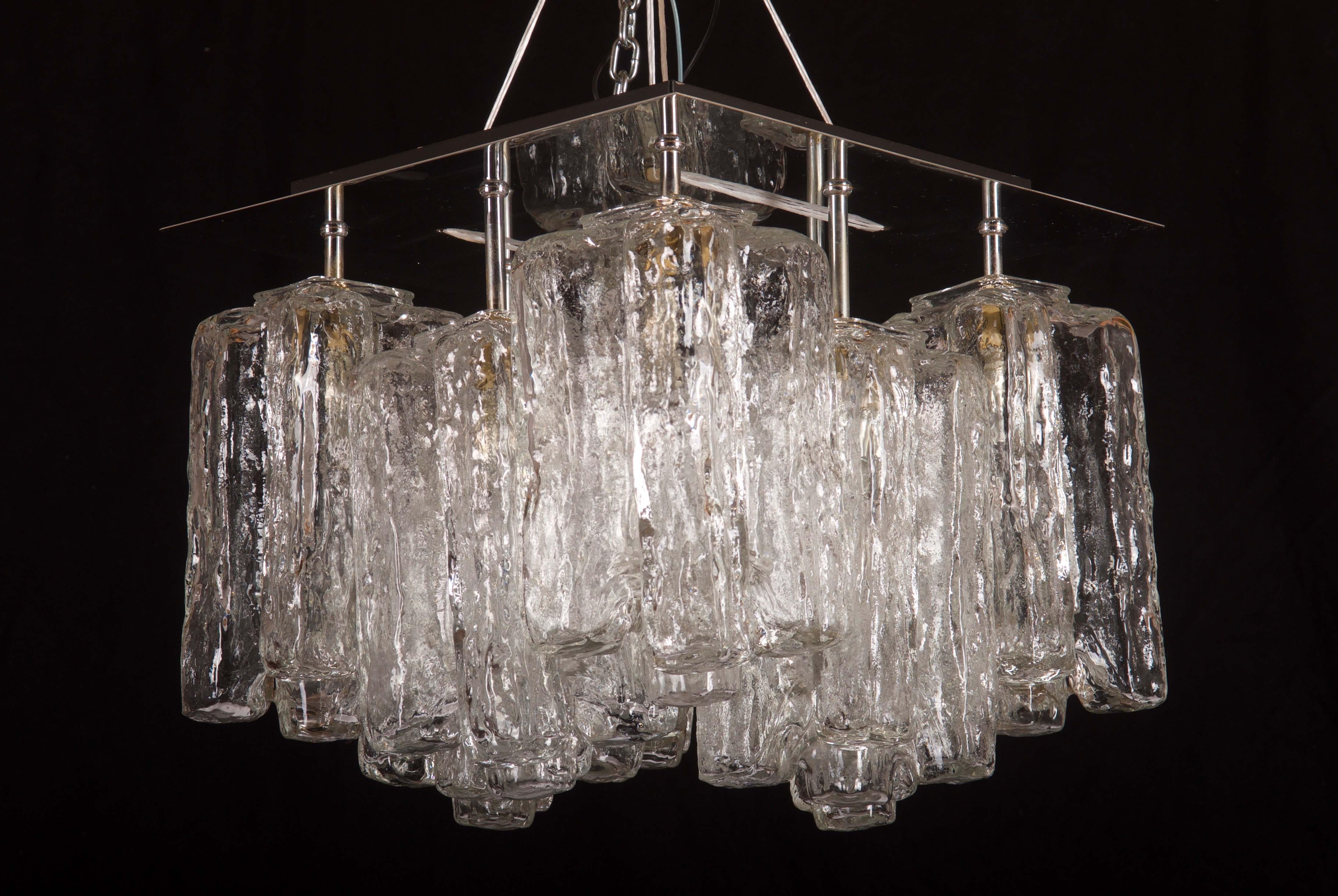 Beautiful chandelier made of nickel plated brass plate with eight handblown glass shades, each fitted with E14 sockets. Made by. J.T. Kalmar in the 1970s.