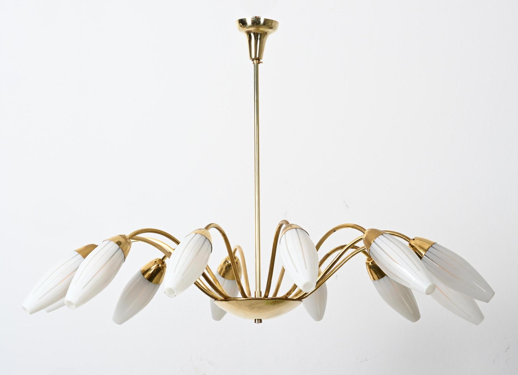 Brass frame with 12 arms and opaline glass shades white each fitted with E14 sockets. Made in Vienna by Rupert Nikoll in the late 1950s. Total height can be customized.