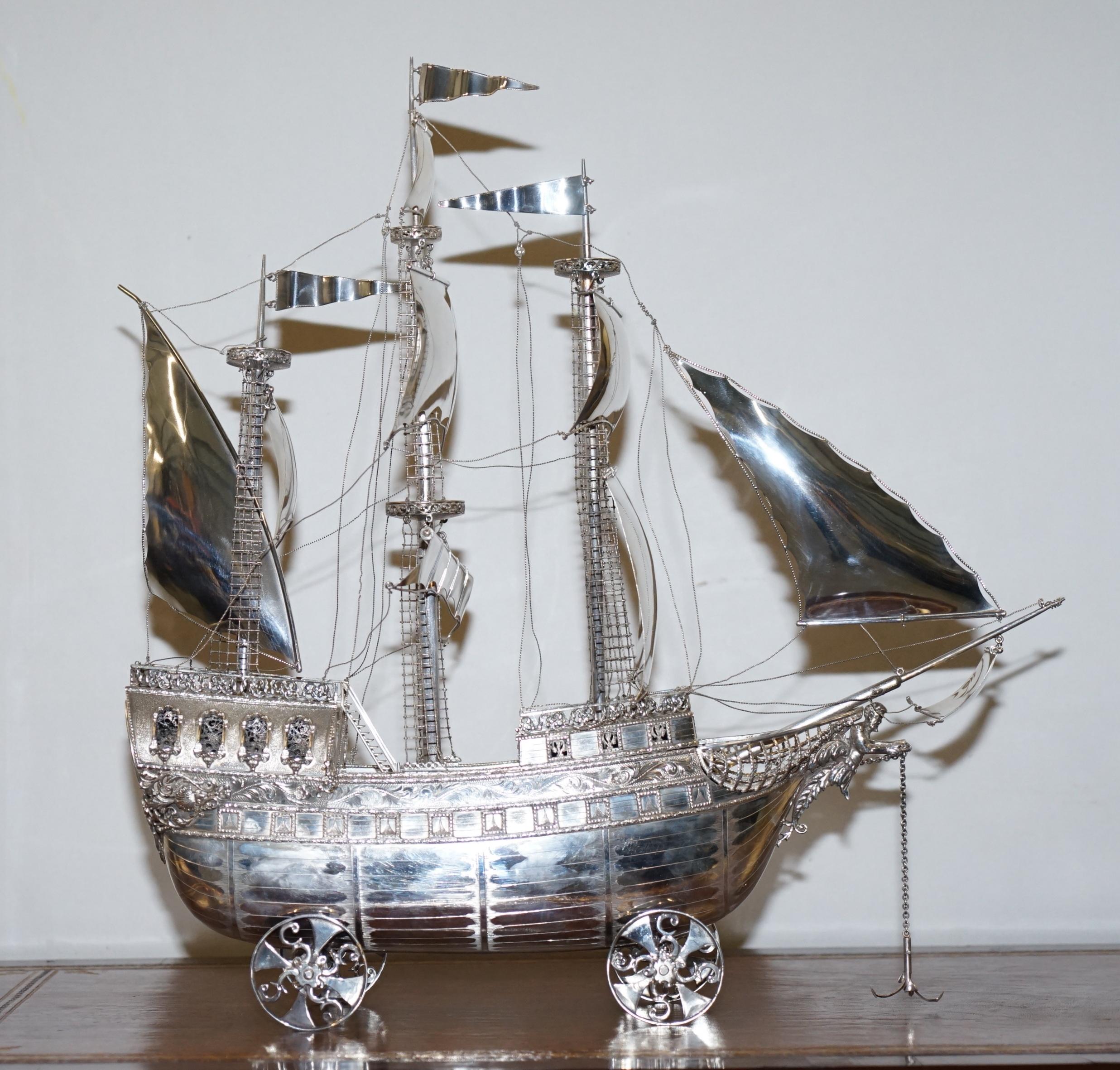 Wimbledon-Furniture

Wimbledon-Furniture is delighted to offer for sale stunning solid 925 Silver NEF ship or boat fully hallmarked with London Import marks for 1977 and made by the International Bullion & Metal Brokers

This is a large scaled very