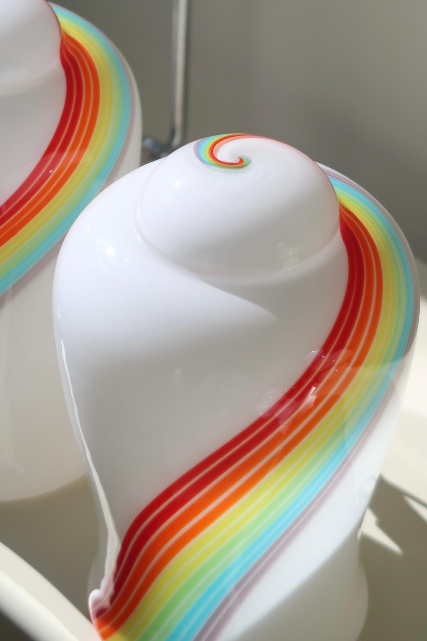Vintage Murano table lamp in a special shape with a rainbow swirl. The lamp is mouth-blown in one piece of glass. Handmade in Italy, 1970s. H:29 cm D:17 cm


