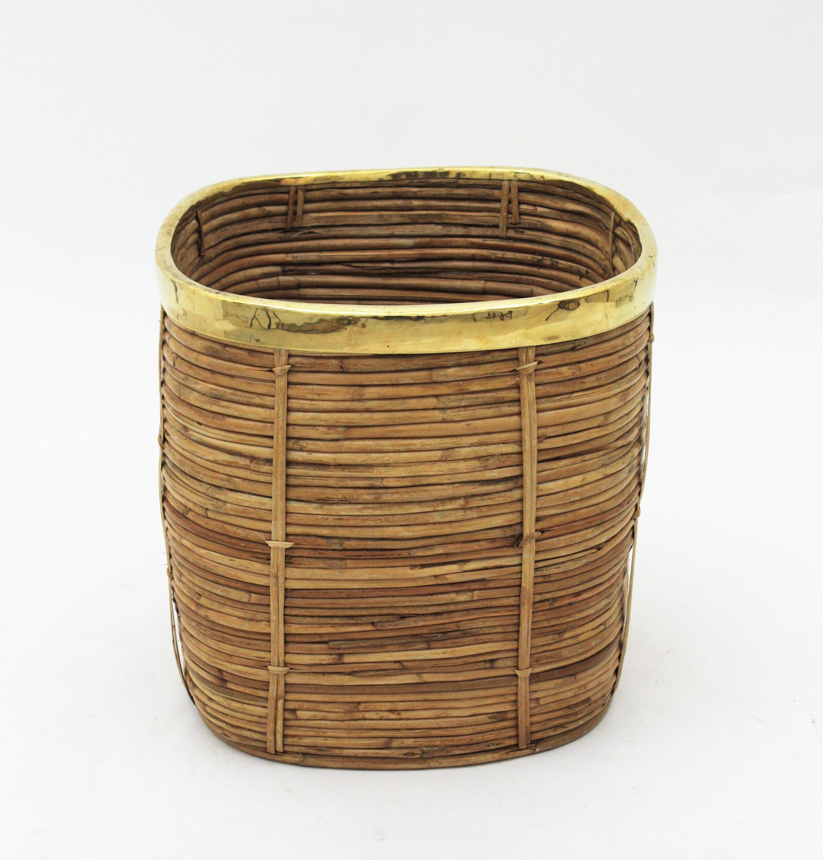 Beautiful Mid-Century Modern rattan and brass large square planter. 
Handcrafted in Italy, 1970s. 
Square shape with gilded brass rim. 
Inspired on Gabriella Crespi designs.
It can be used as planter, storage basket or paper bin.
Very good