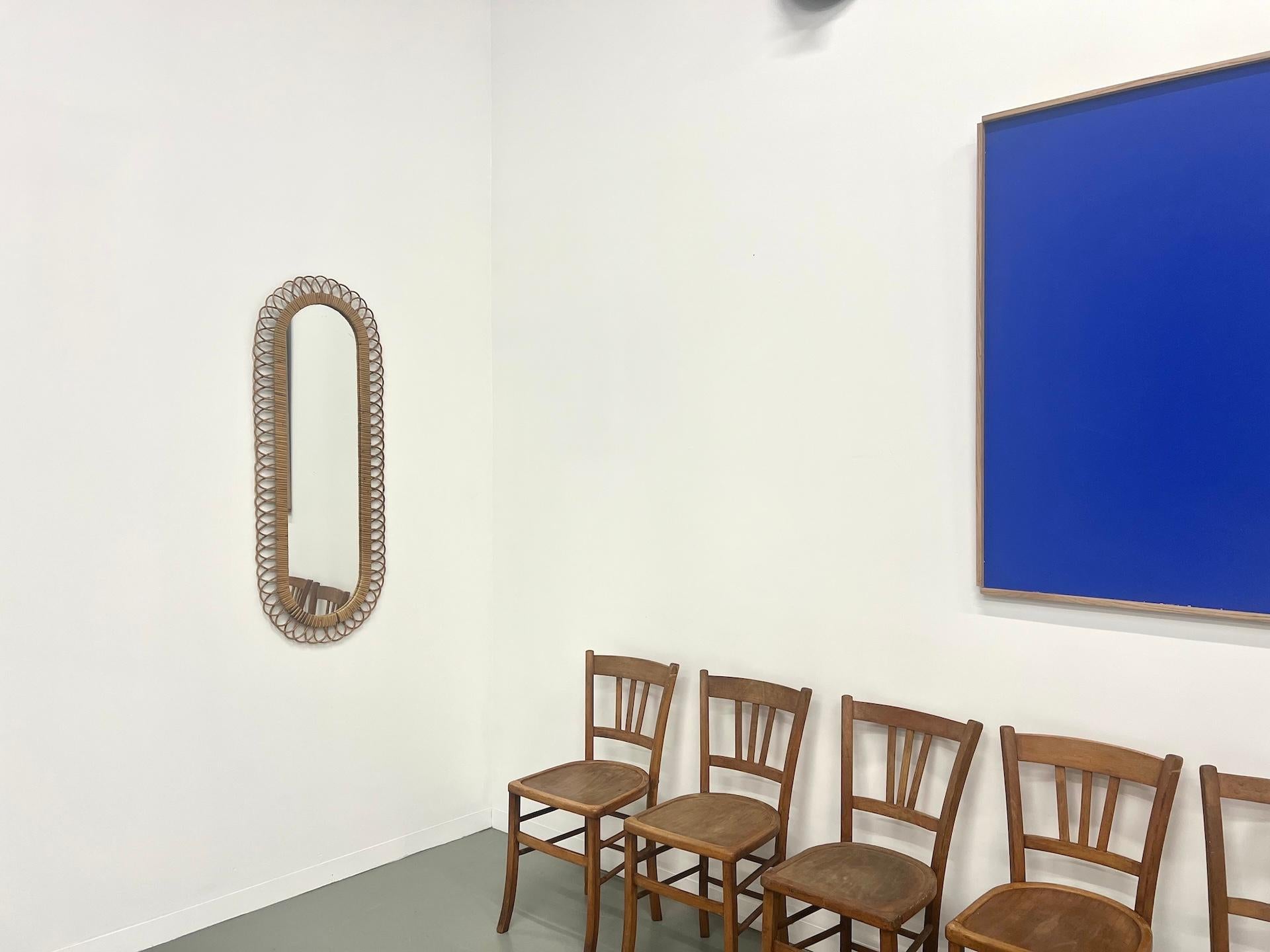 Large rattan mirror in very good vintage condition by designer Franco Albini published in 1960 by Bonacica.

3 hanging system on the back to install it horizontally or vertically.

Dimensions: H125 x L49 cm