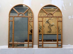 Espejo grande de ratán cerrado . Italia, años 70