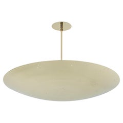 Grande lampadario a cupola in ottone lucido traforato di Raul Reyes "Rey 26
