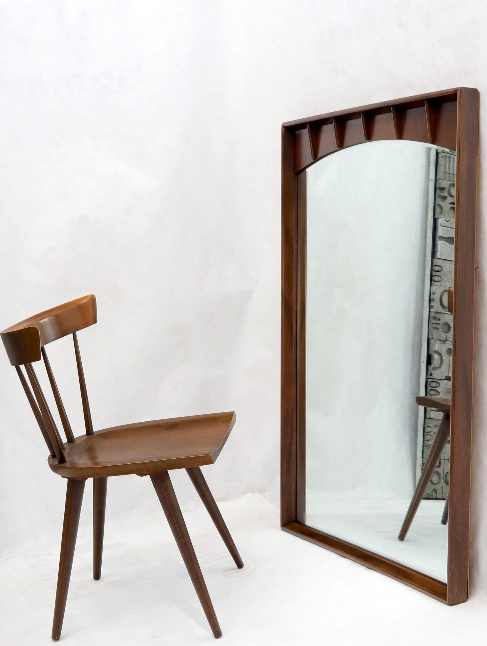 Mid-Century Modern rectangle walnut wall mirror.
  