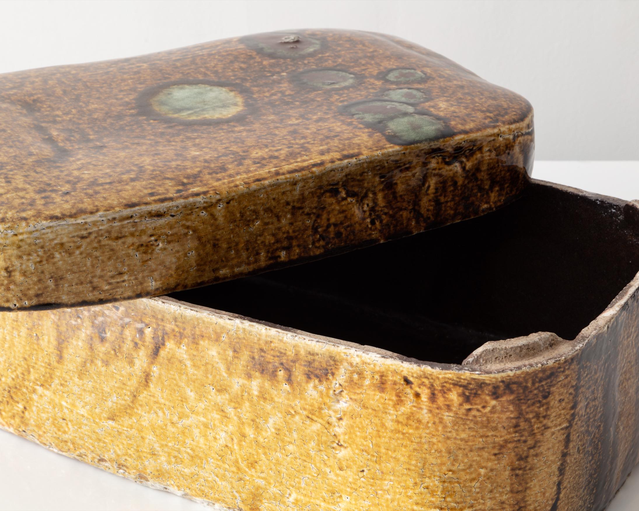 Golden brown large rectangular ceramic box with a spotted lid, glazed ceramic. Designed and made by Hun-Chung Lee, Korea, 2011.
 