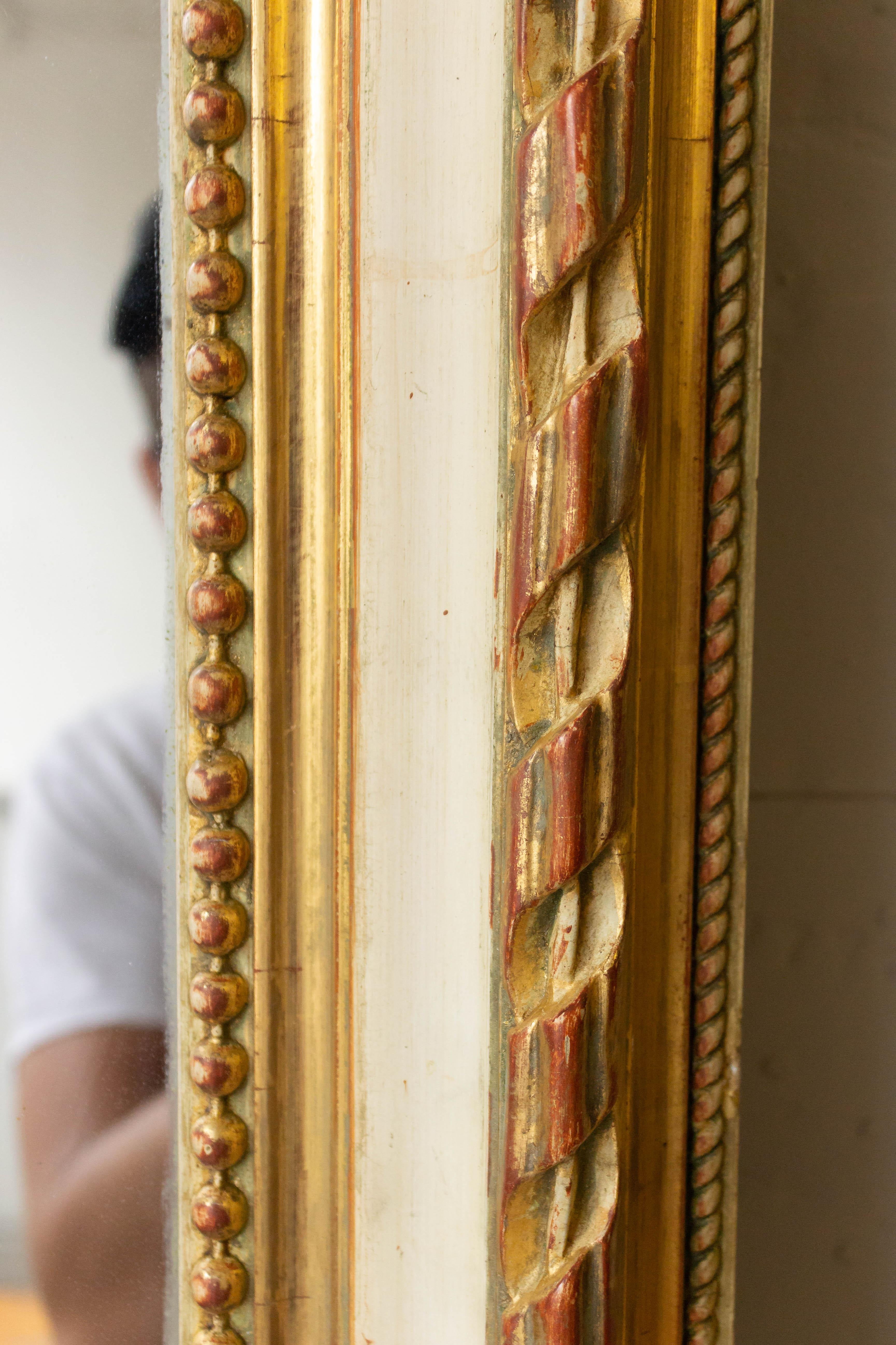 large mirror with gold frame