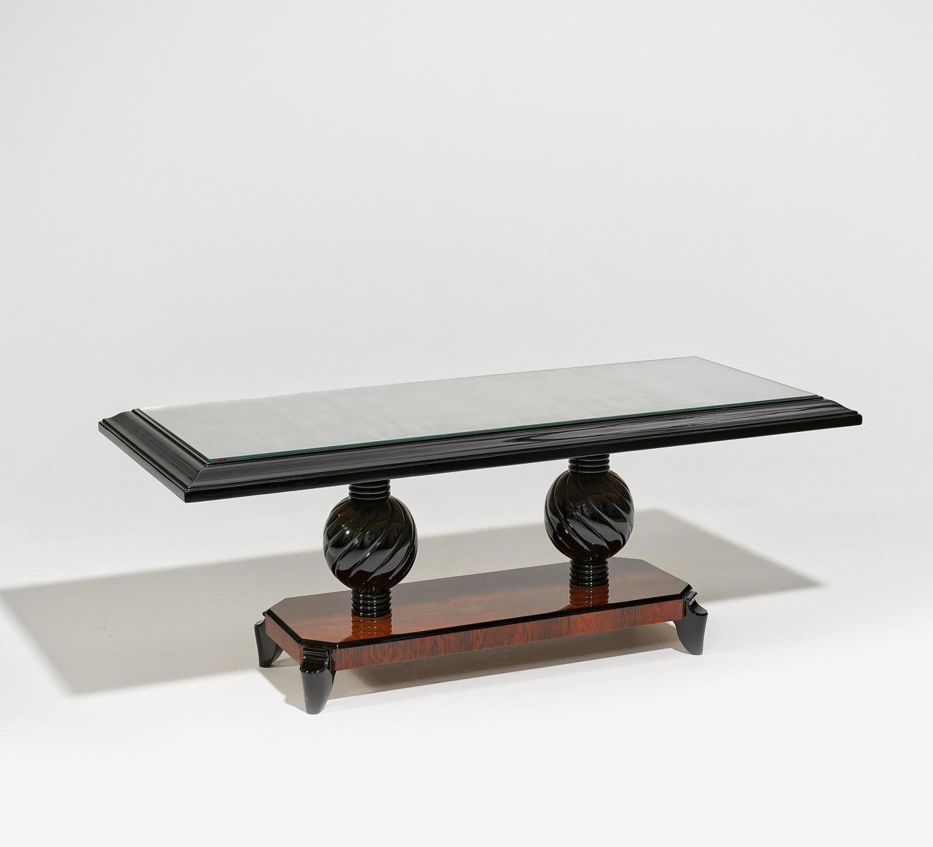  Massive large rectangular French Art Deco coffeetable, sofa table by Souyeux, Ebenist from Nay, South of France. 
Makassar veneer. Black lacquer. New spear glass. Professionally restored. Documented. Gazette Drouot.
Very solid quality.